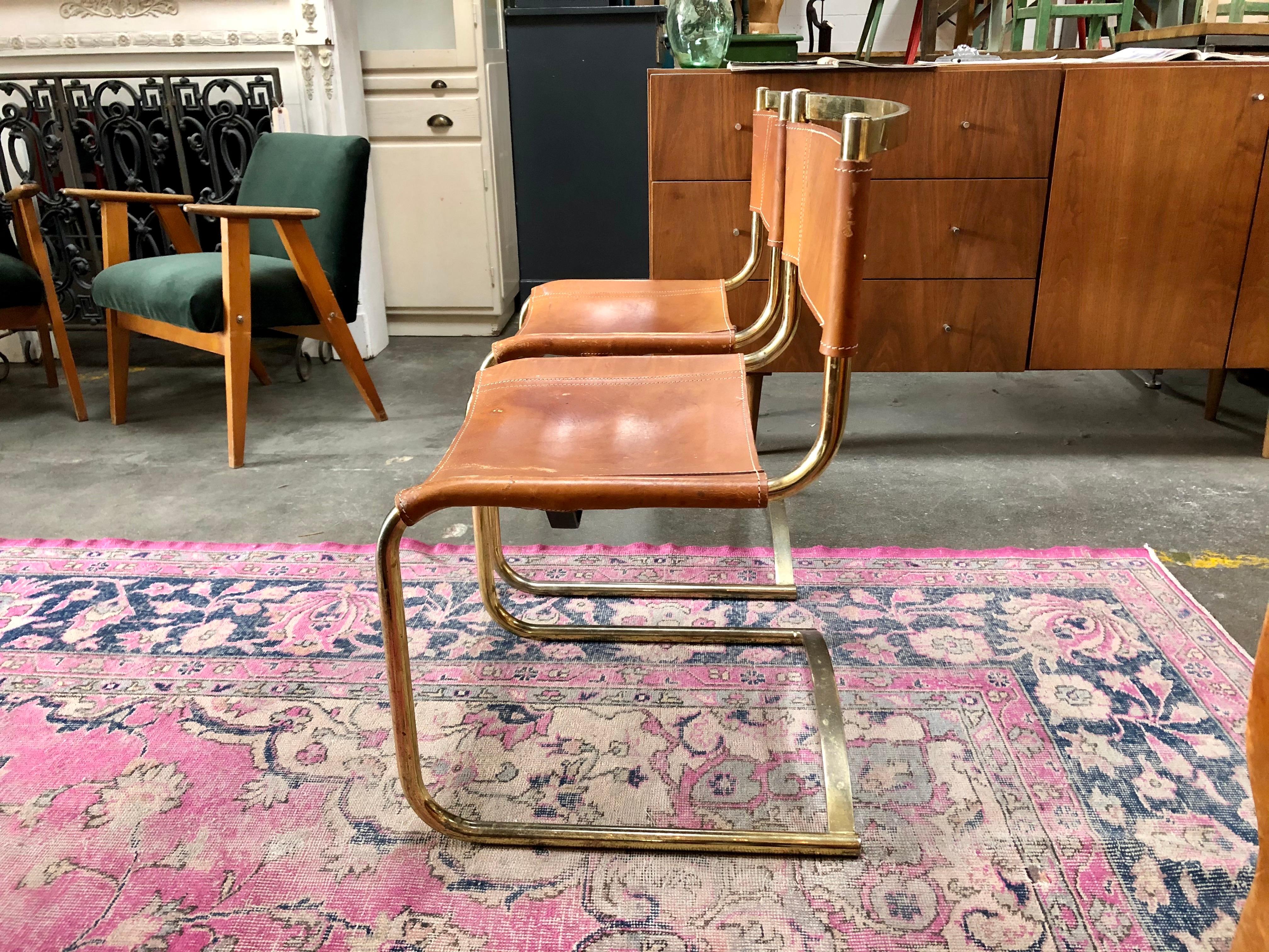 European Pair of Mid Century Leather & Brass Chairs