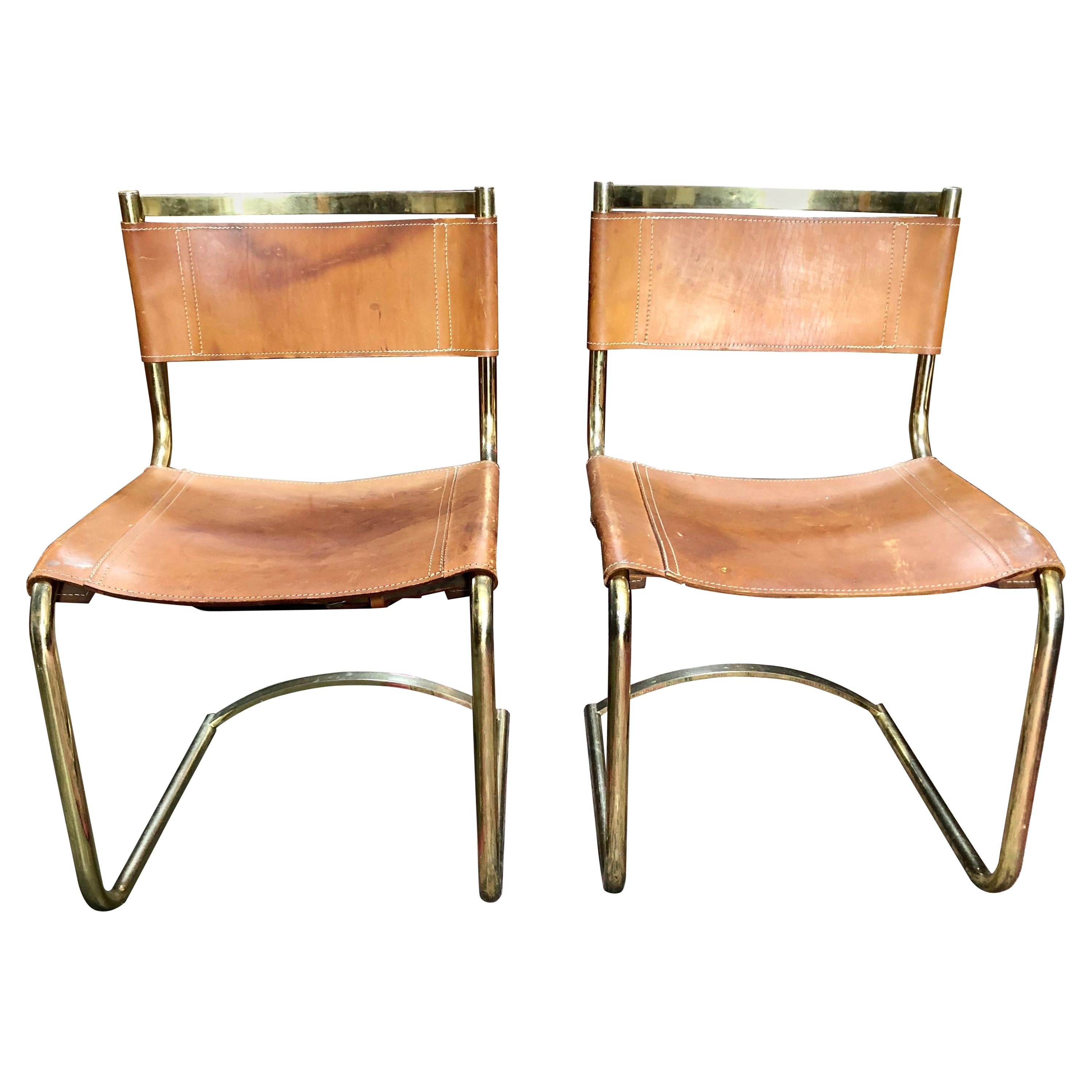 Pair of Mid Century Leather & Brass Chairs