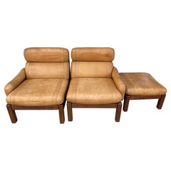 Pair of Mid-Century Leather Lounge Chairs with Ottoman