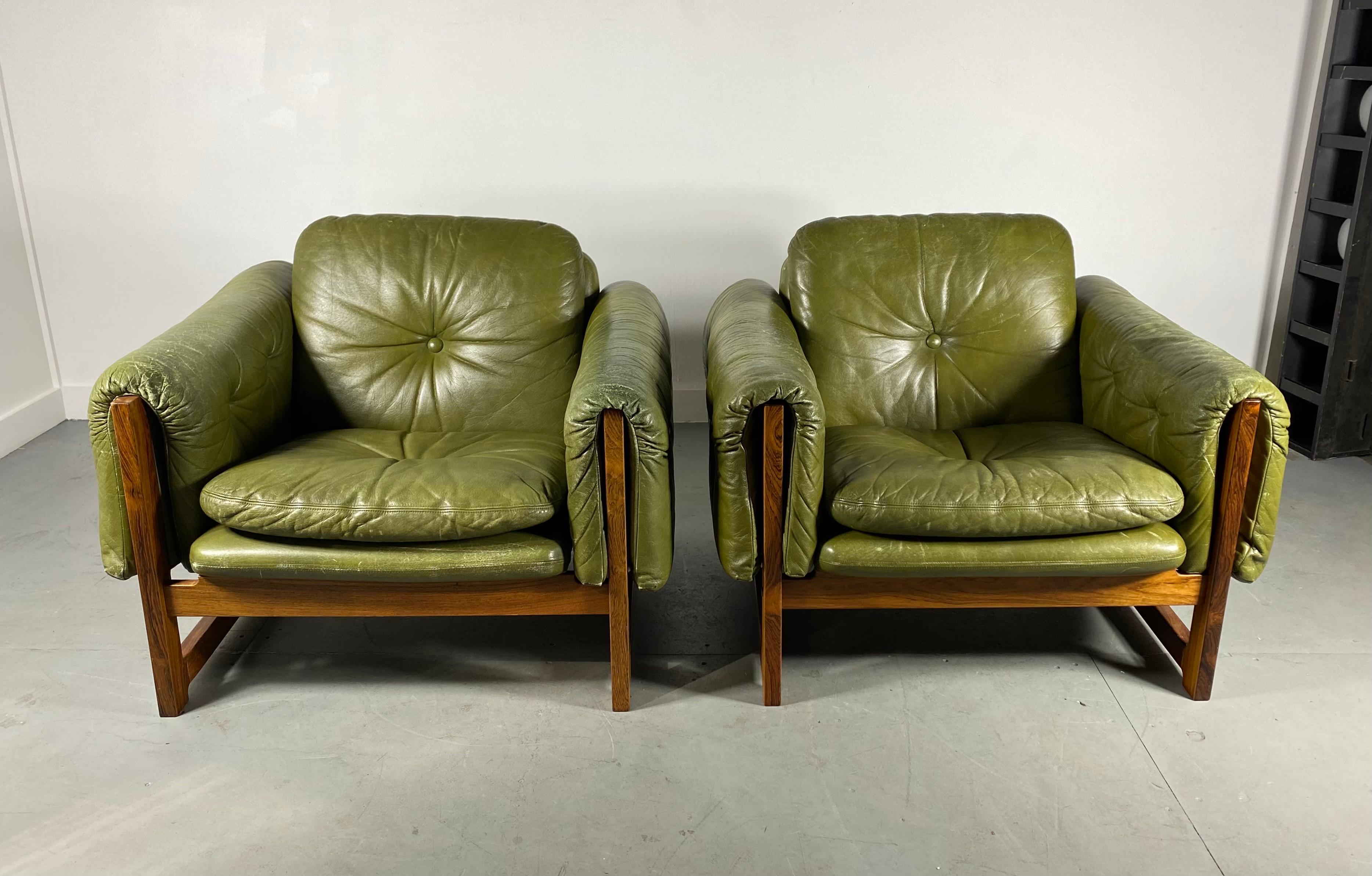 A pair of Pistachio leather lounge chairs, 