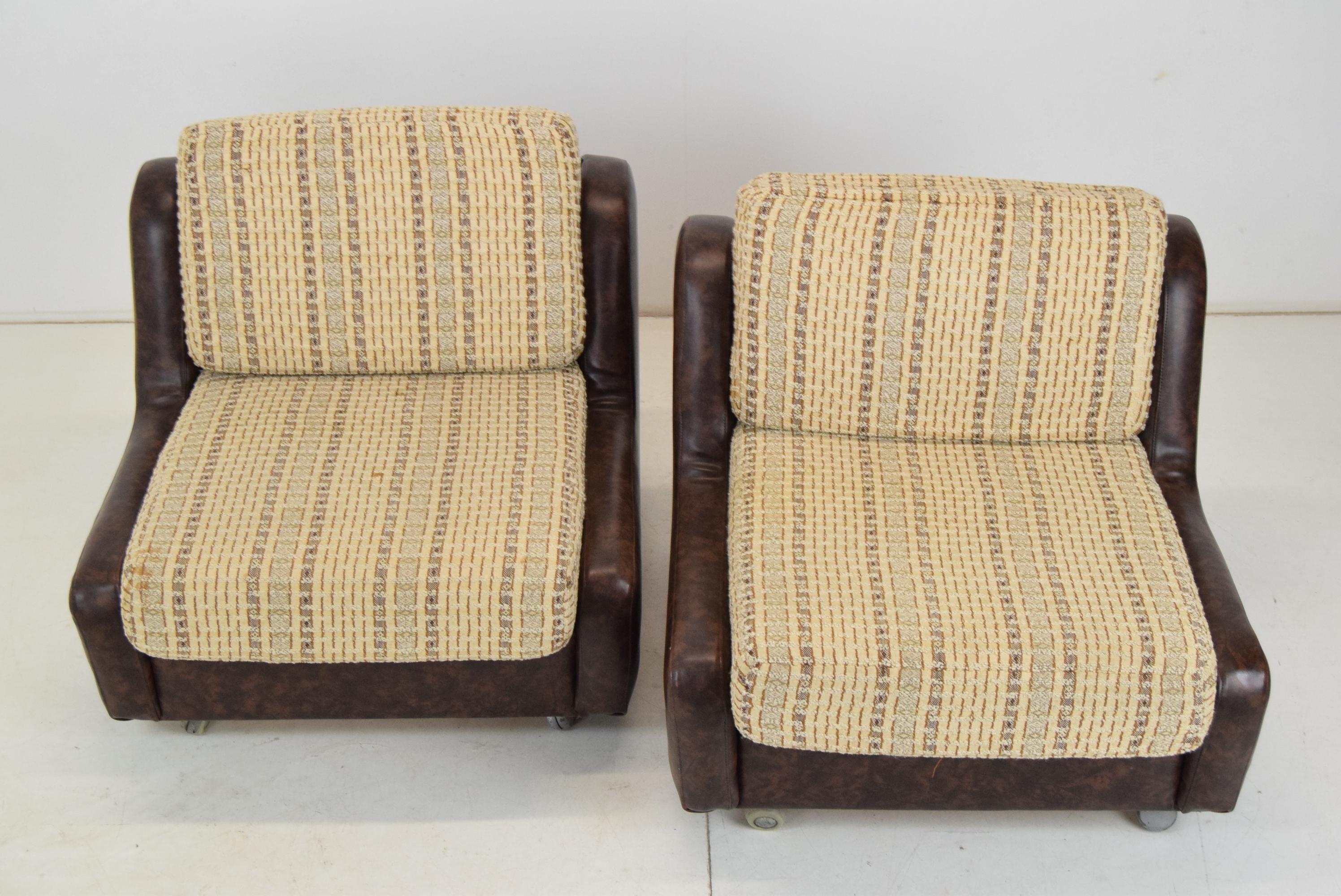 Czech Pair of Mid-century Leatherette Armchairs on the wheels, 1970's.  For Sale