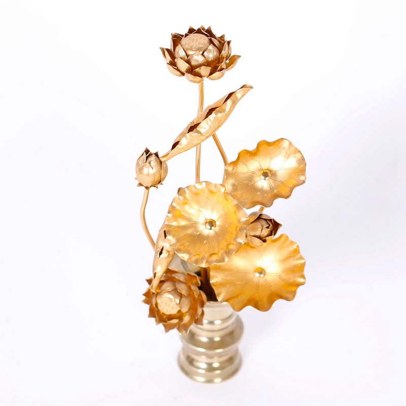 Chic pair of Asian modern iodized aluminum lotus flower arrangements blooming in assorted stages in classic form brass vases. Hand polished and lacquered for easy care.