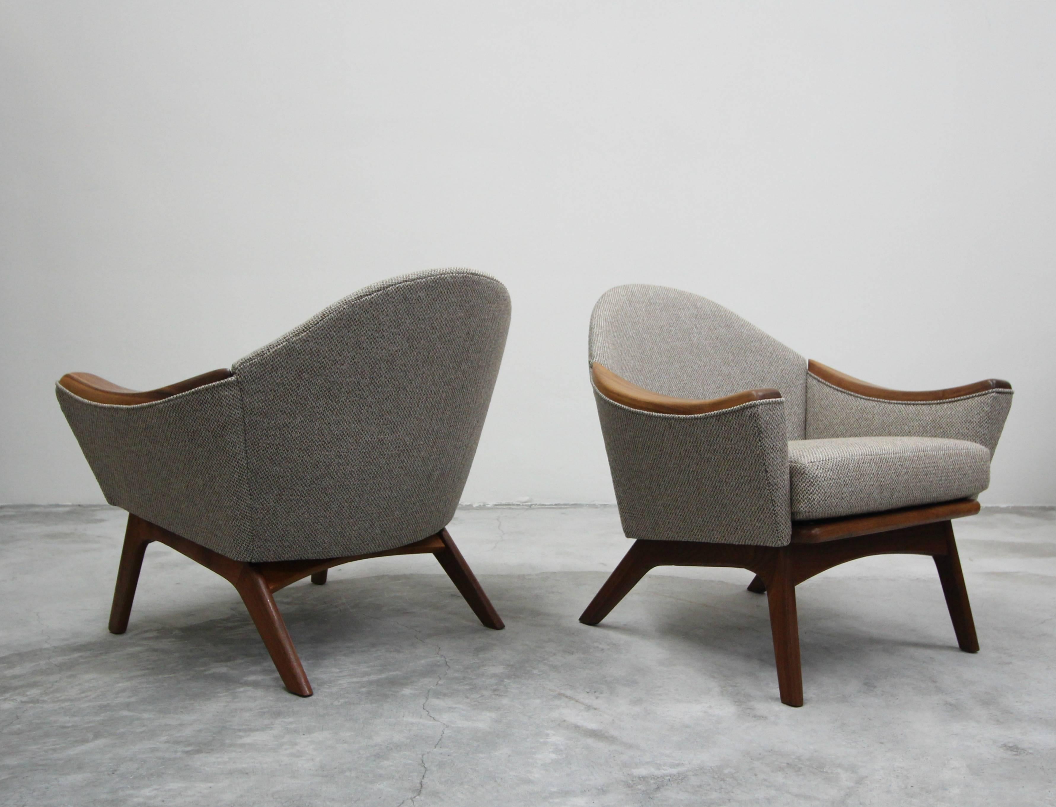 Classic pair of midcentury lounge chairs by Adrian Pearsall, Model 1806-C. These chairs have beautiful lines and walnut details. The walnut arms and bases perfectly compliment the new beige and gray tweed fabric.

Chairs have been professionally