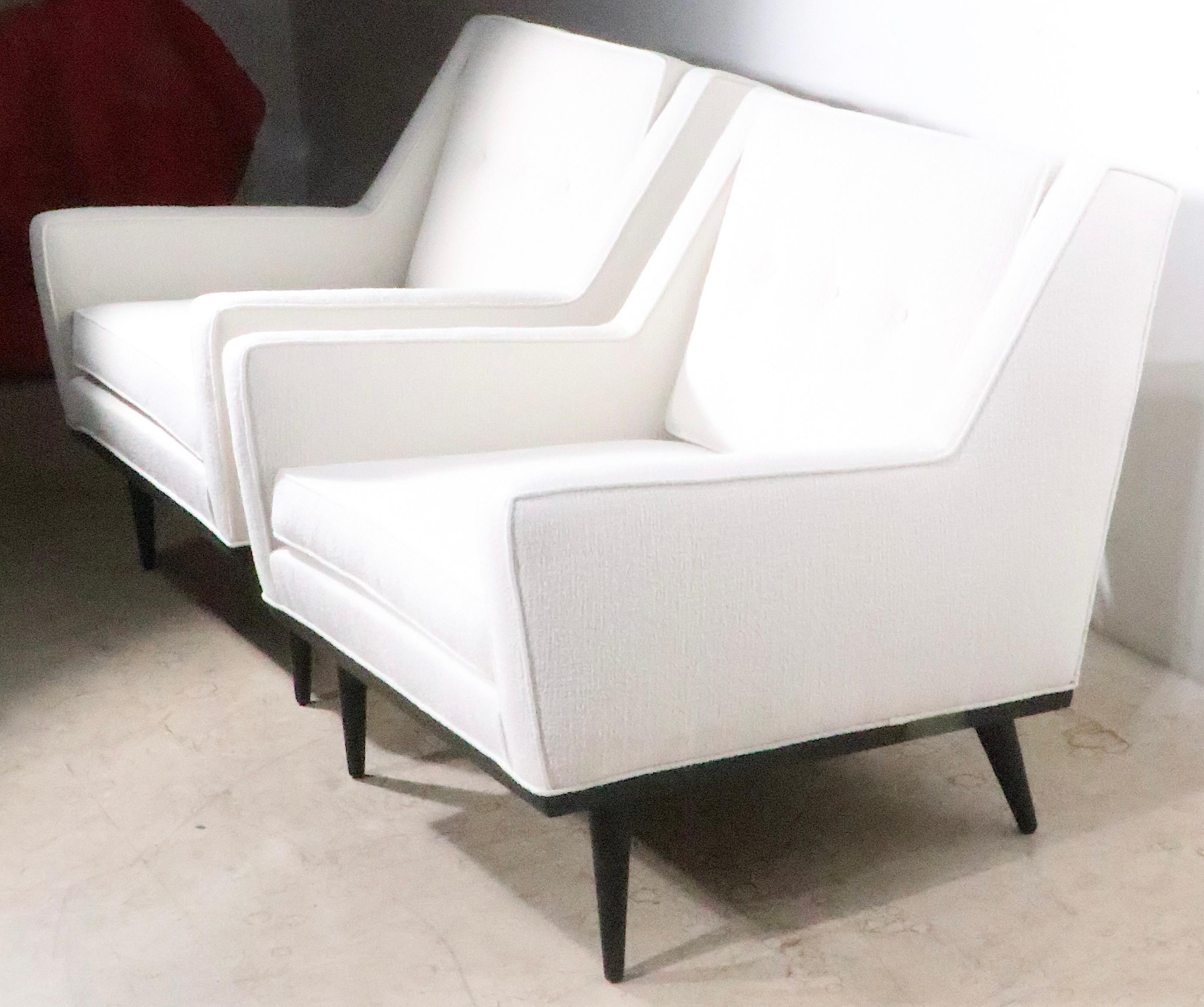 Iconic midcentury chairs, from Milo Baughman, for James Furniture Inc. These lounge chairs feature a voguish, and sophisticated design, angular and architectural, while still being relaxed and comfortable. Both have been completely professionally