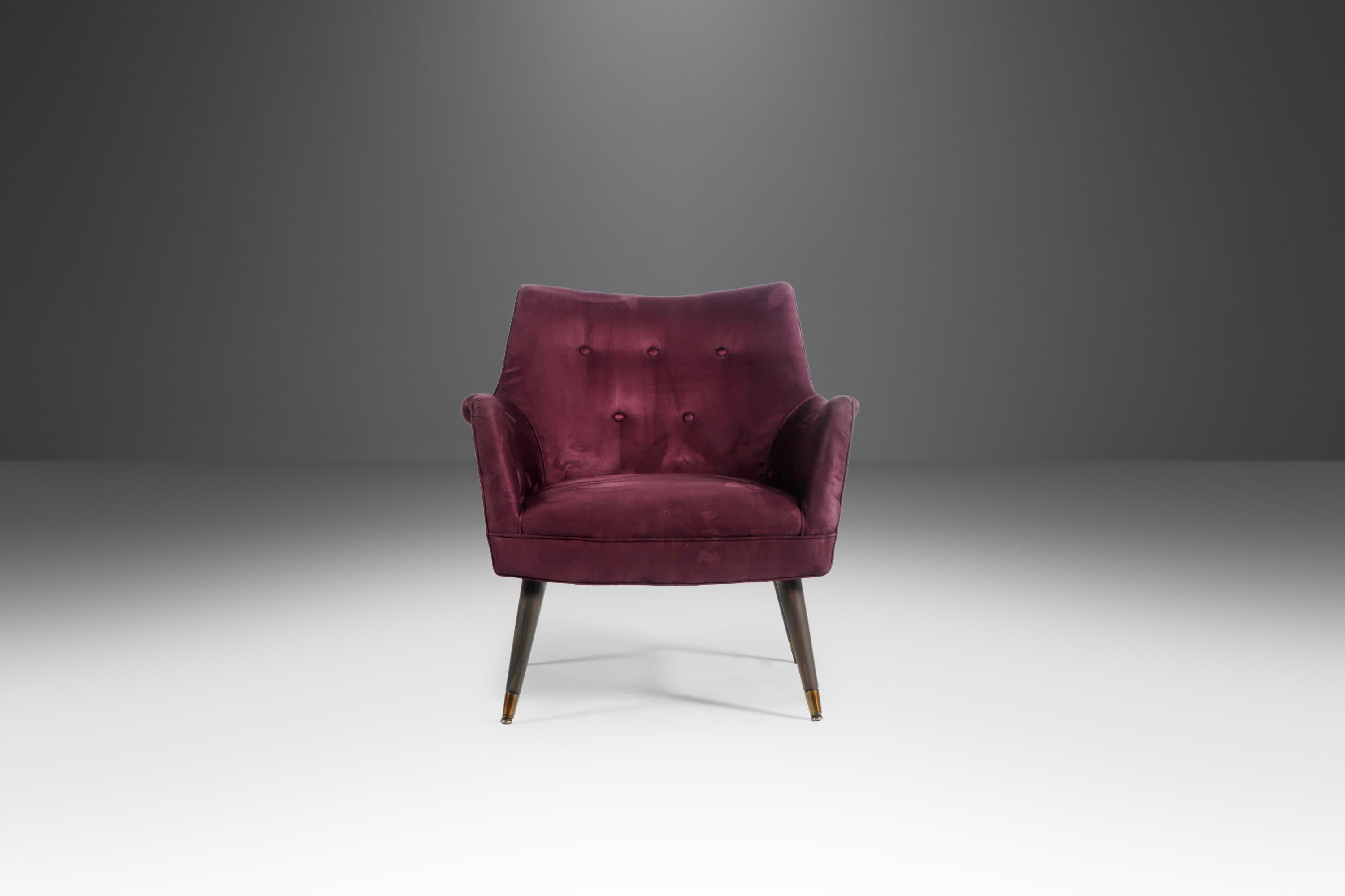 The perfect amalgamation of luxurious materials and captivating shapes these exquisite arm chairs are the perfect seating for almost any space both home or office. The fabulous micro suede, in a deep purple, is as comfortable to the touch as it is