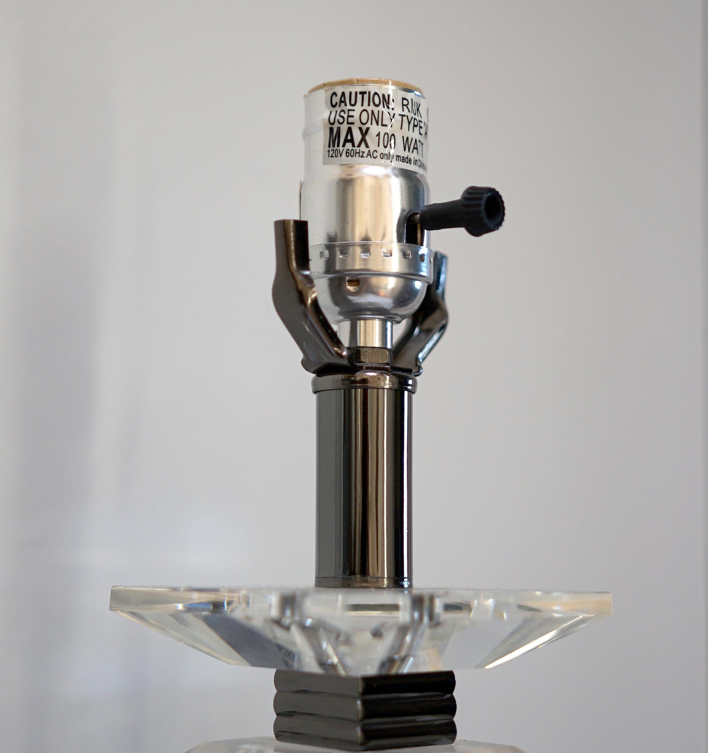 Poli Paire d'objets en Lucite du milieu du siècle en vente