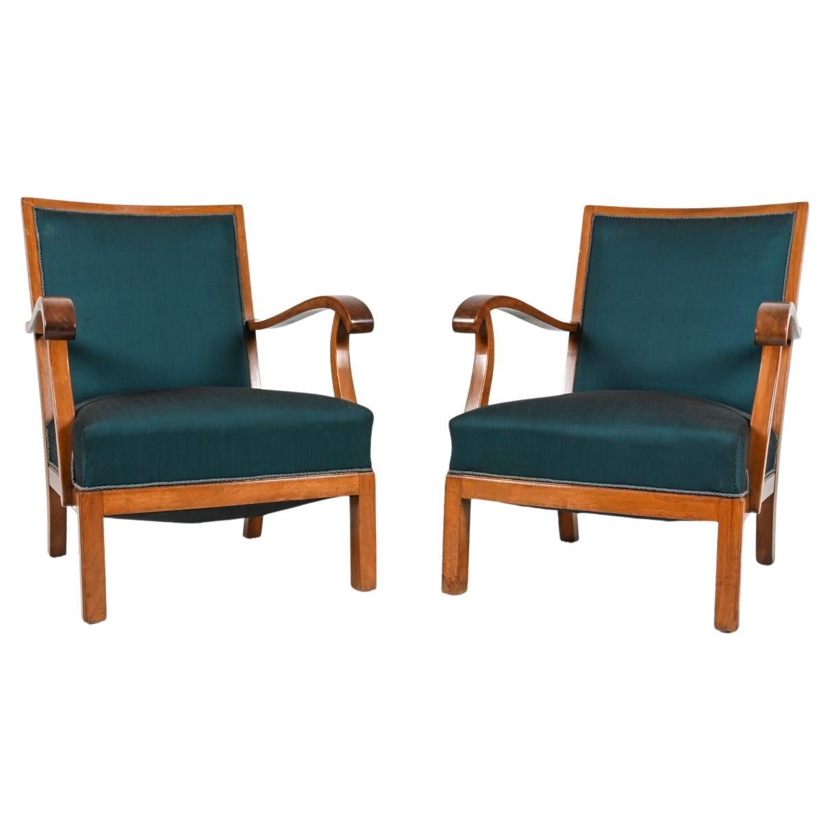 Pair of Mid-Century Mahogany Lounge Chairs by Erik Wørts For Sale