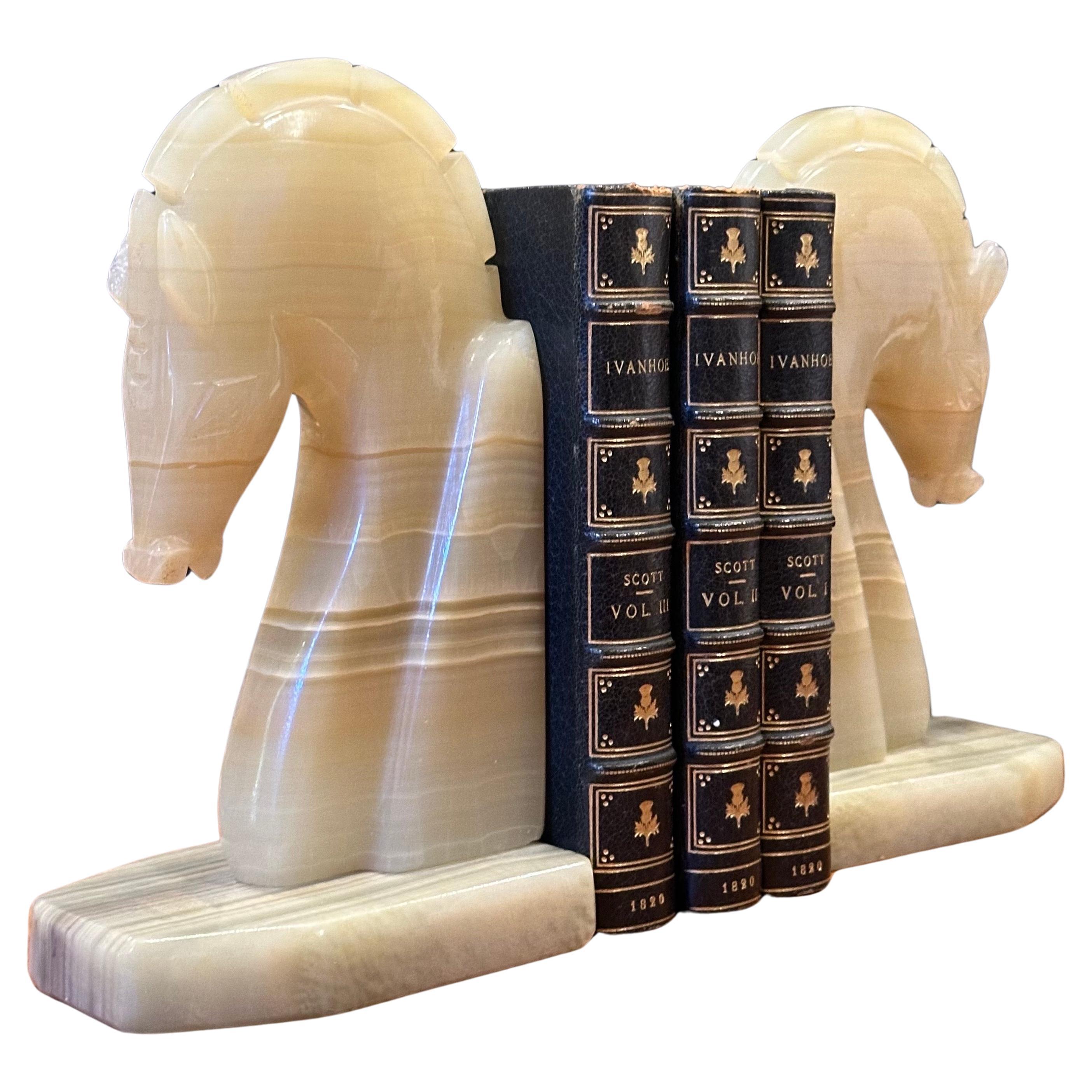 Very stylish pair of large mid-century marble horse head bookends, circa 1970s. The bookends are heavy and solid and well crafted. They measure 10.5