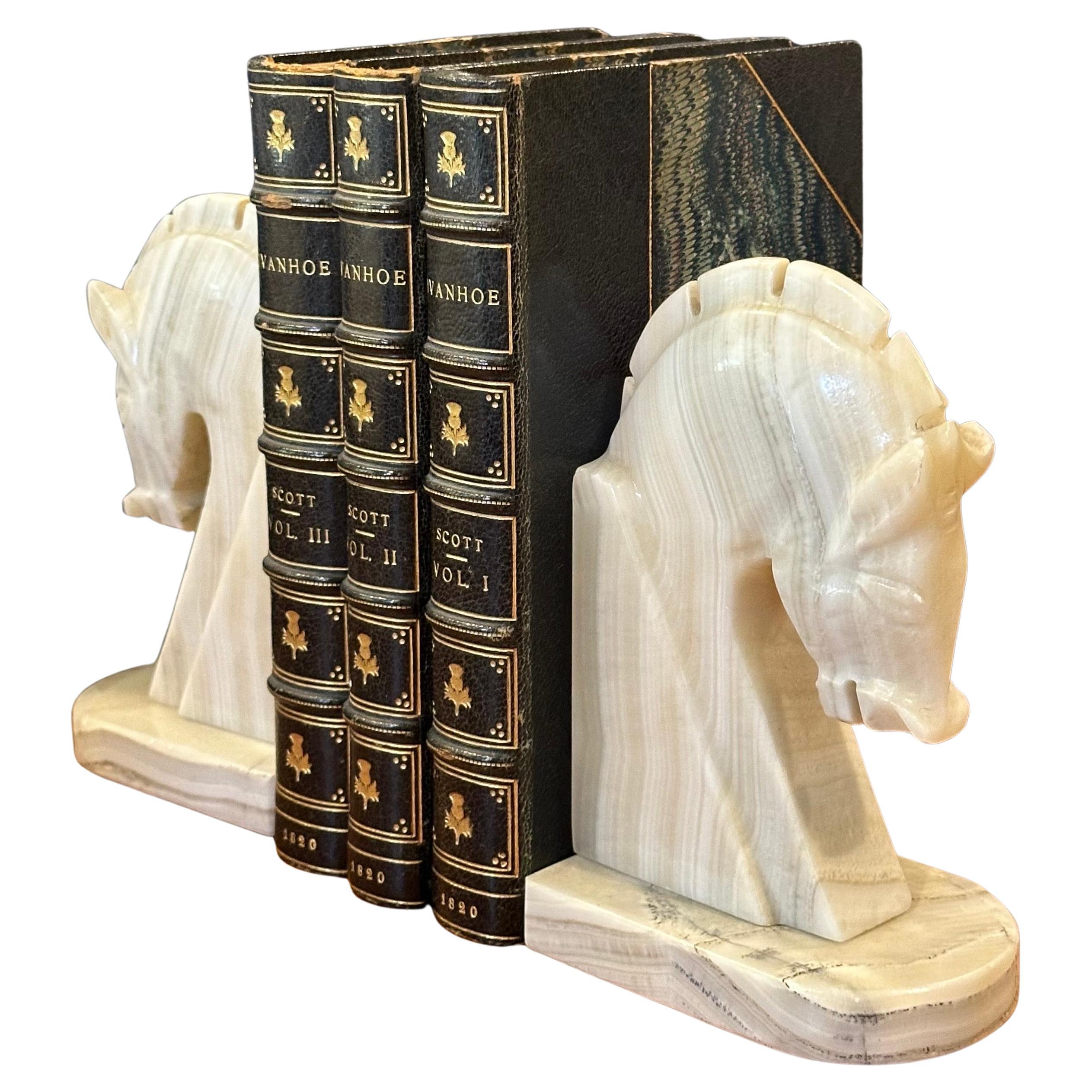 Very stylish pair of mid-century marble horse head bookends, circa 1970s. The bookends are heavy and solid and well crafted. They measure 8