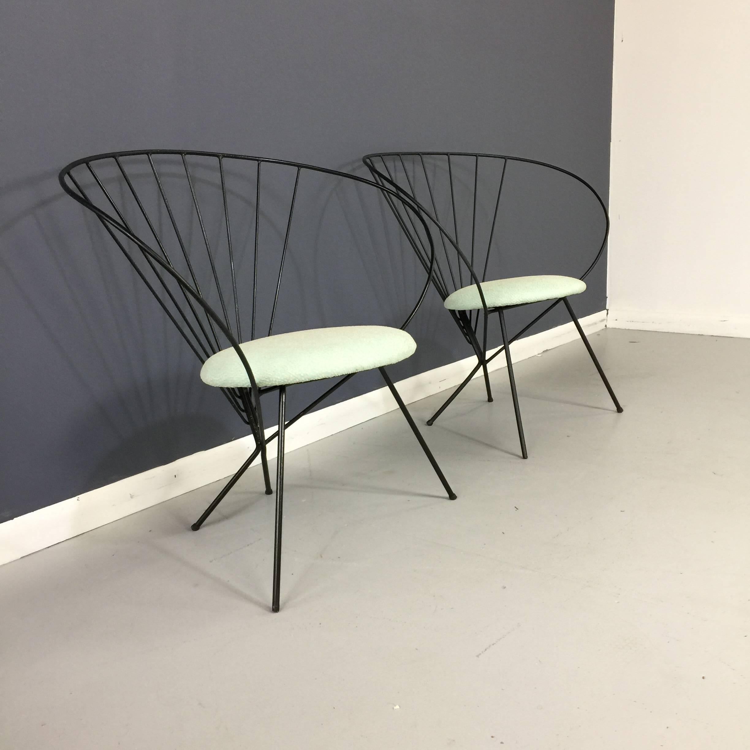 Designed by Robert Kasindorf in 1953, this rare chair has been restored and upholstered in grey and white polka dots!