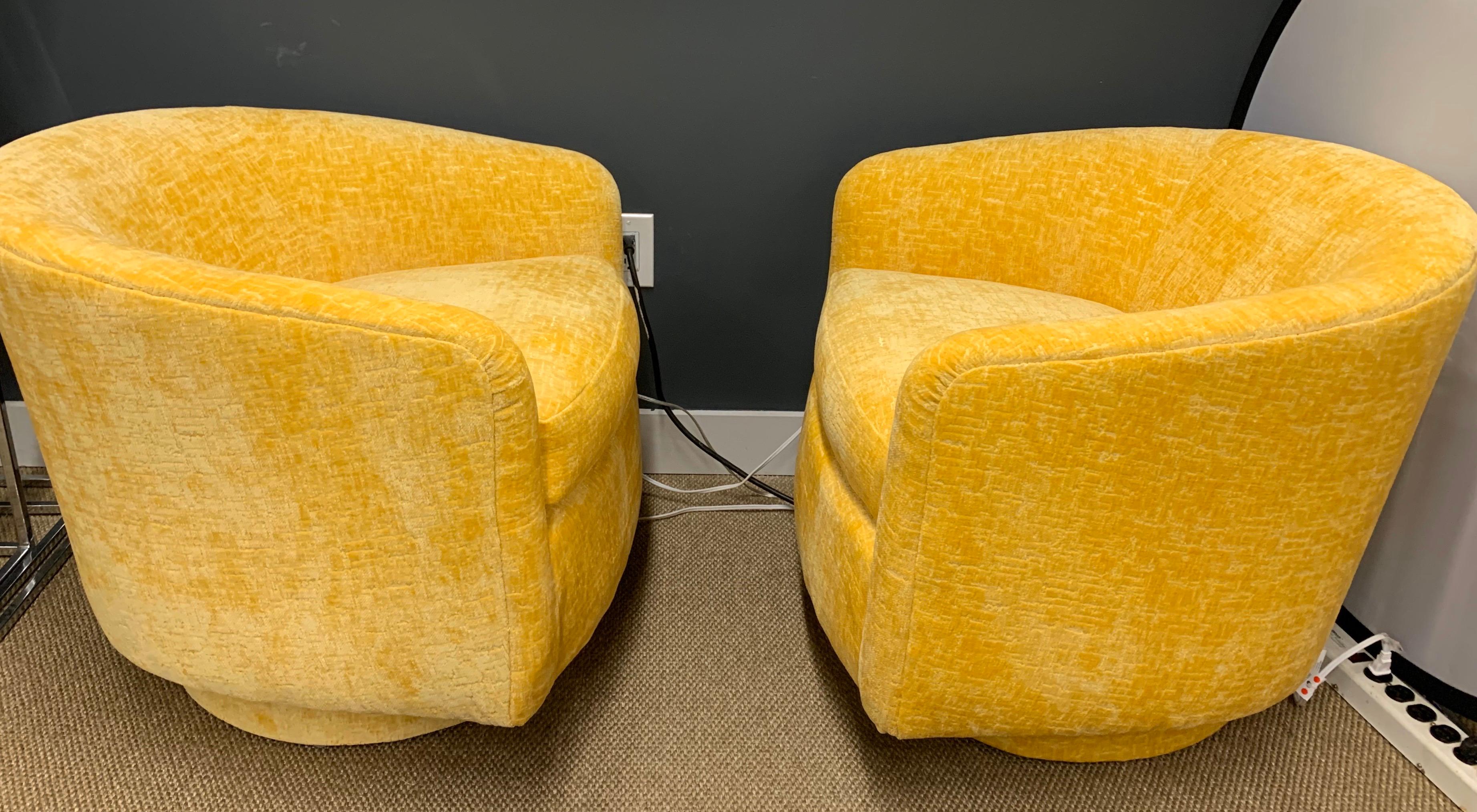 yellow swivel barrel chair