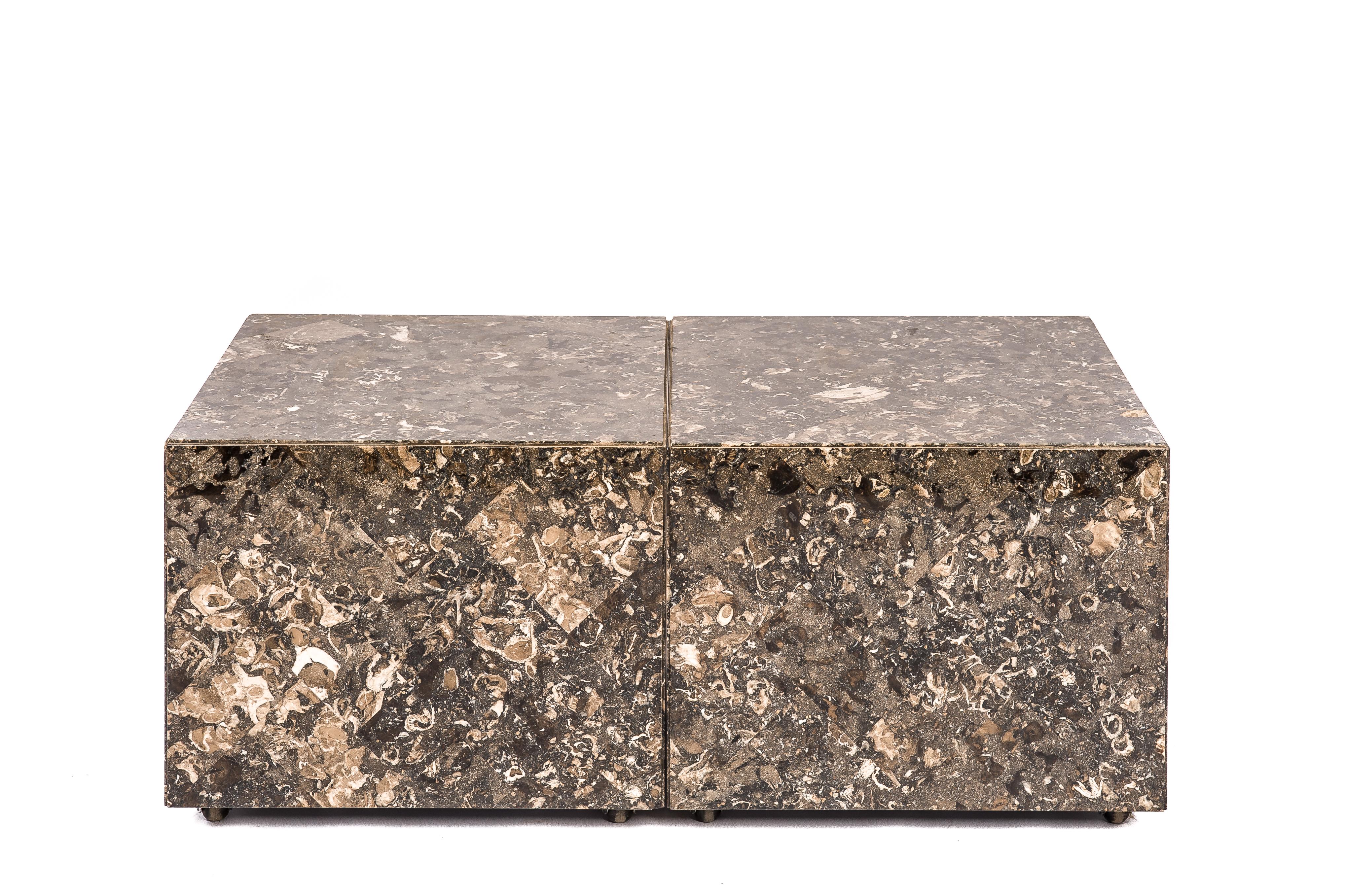 On offer here is a fantastic pair of grey-brown marble side tables or coffee tables made in France in the 1960s. The tables have a white Carara marble base and are covered with diagonally placed tiles in solid Fossil brown marble. This marble