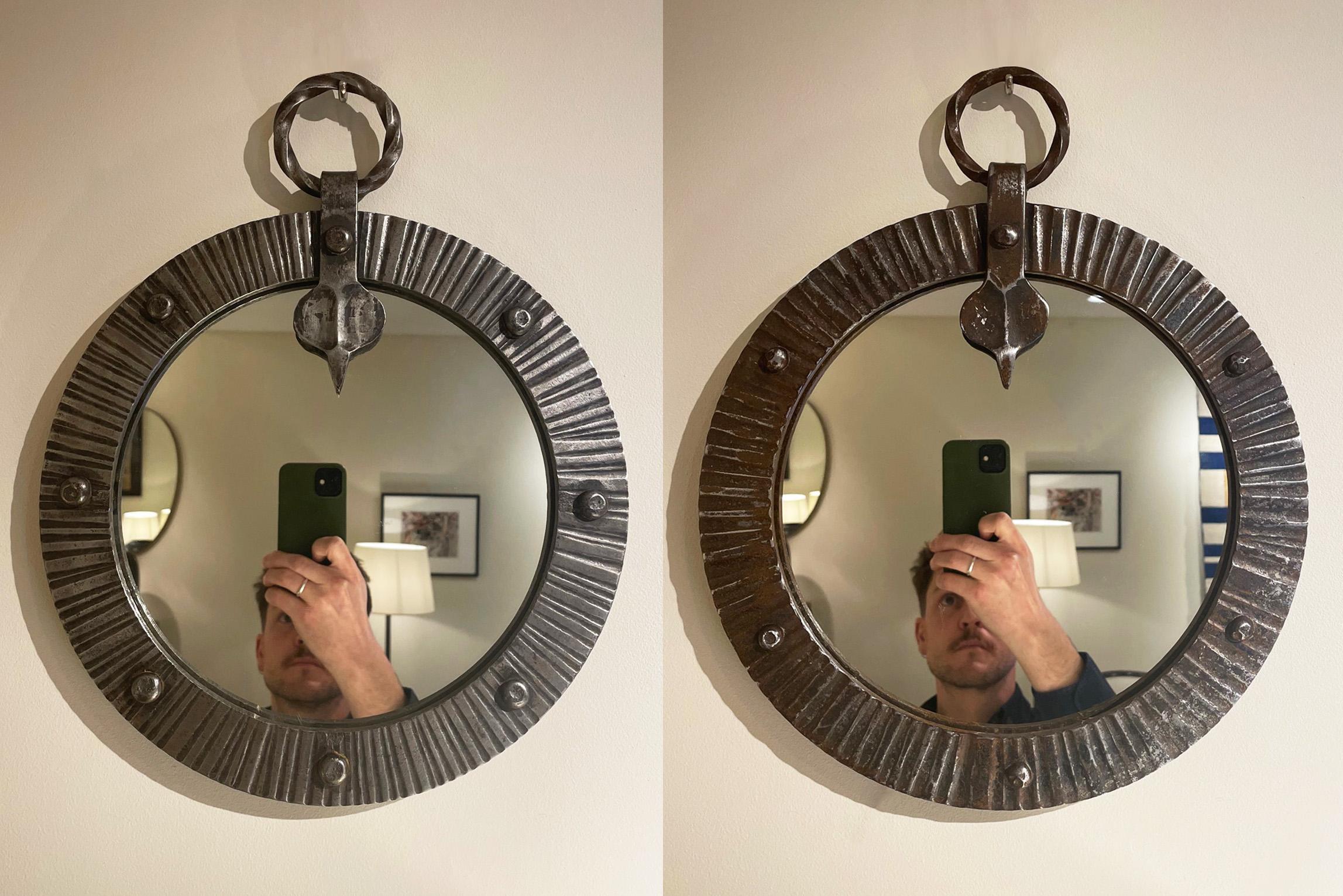 A pair of forged iron circular mirrors.
France, Circa 1950.
Mirror 1: 39 cm high by 32 cm wide.
Mirror 2: 38.5 cm high by 31 cm wide.
