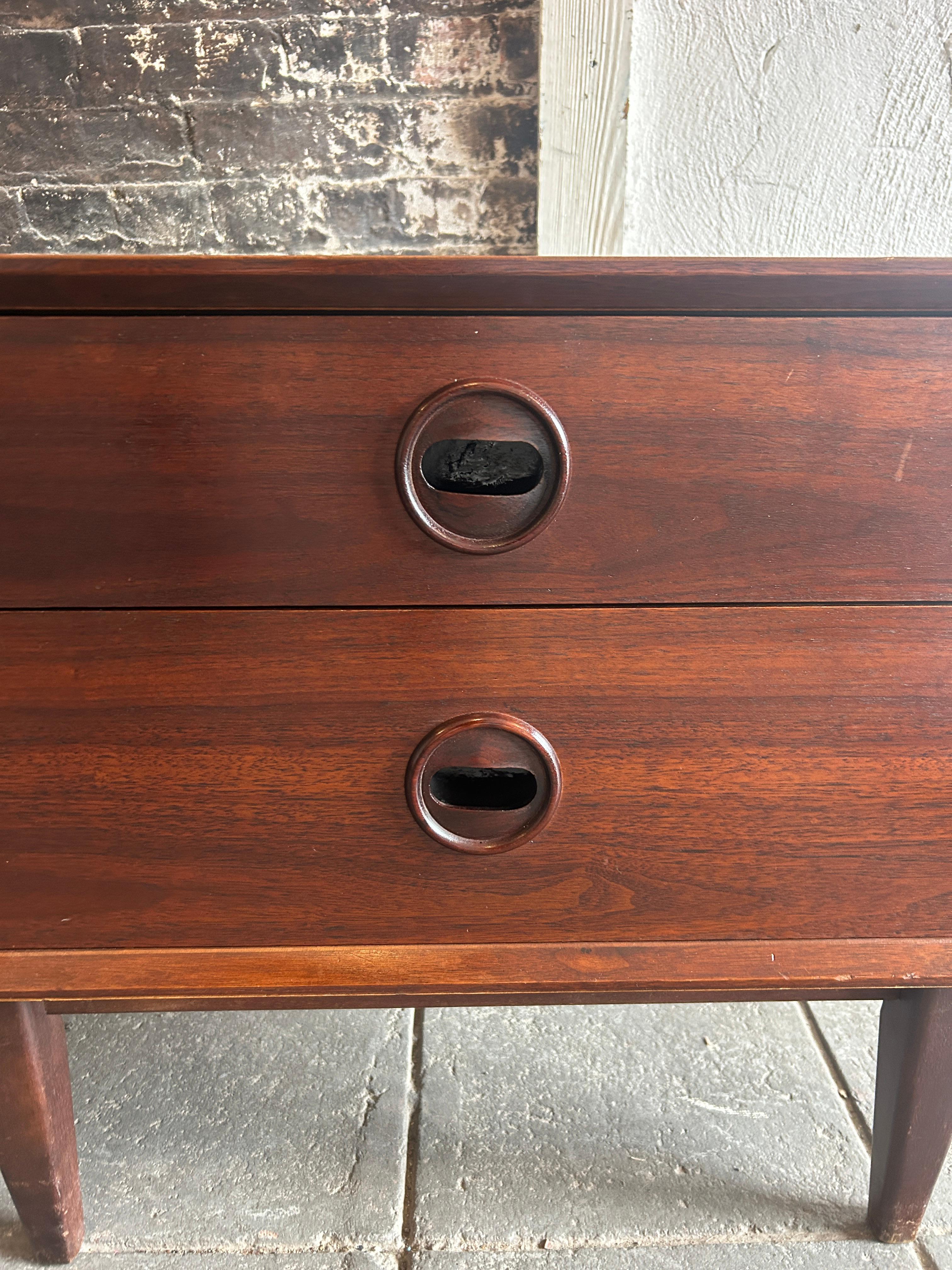 Woodwork Pair of mid century modern 2 drawer walnut nightstands with carved handles  For Sale