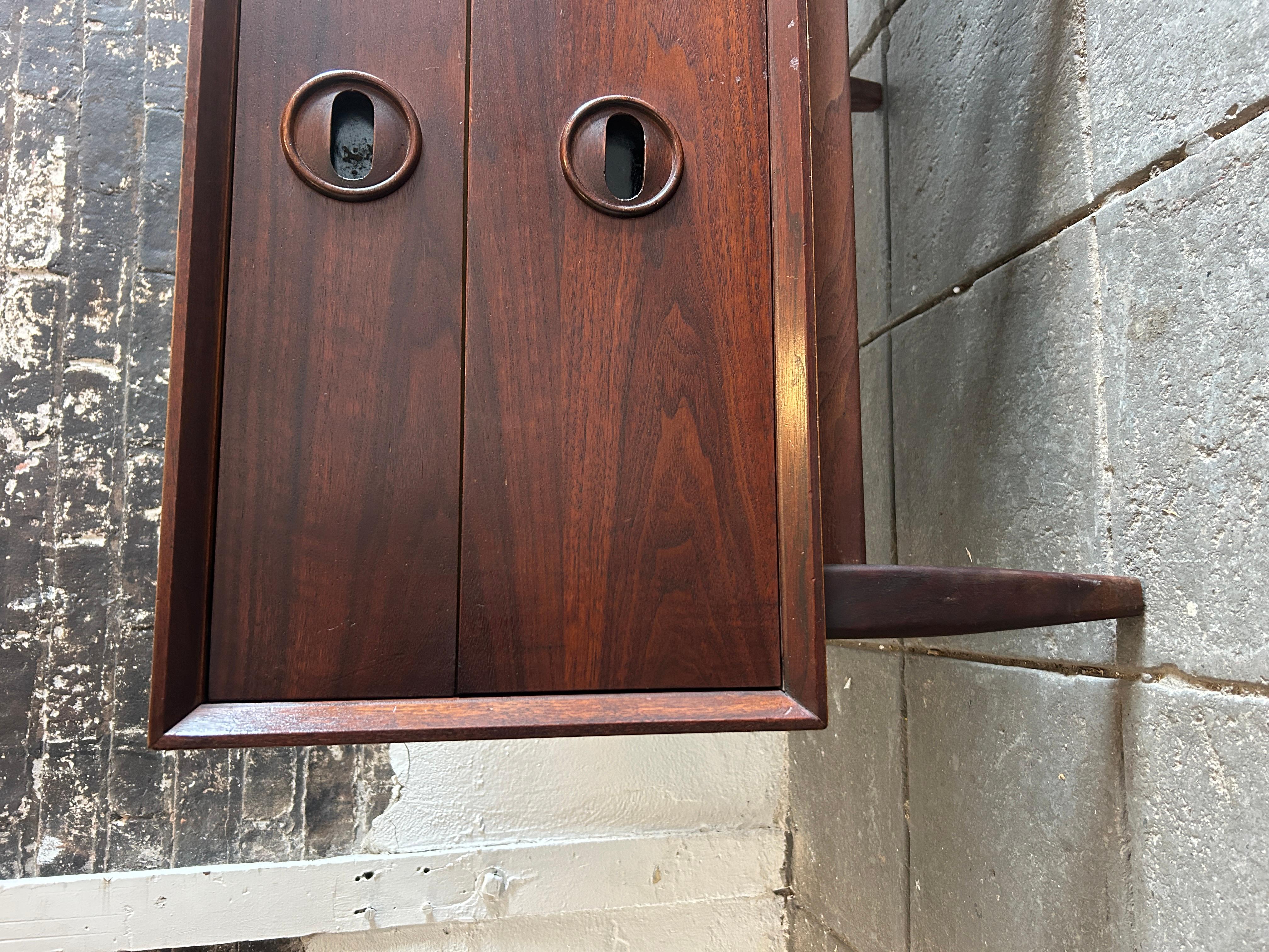 Mid-20th Century Pair of mid century modern 2 drawer walnut nightstands with carved handles  For Sale