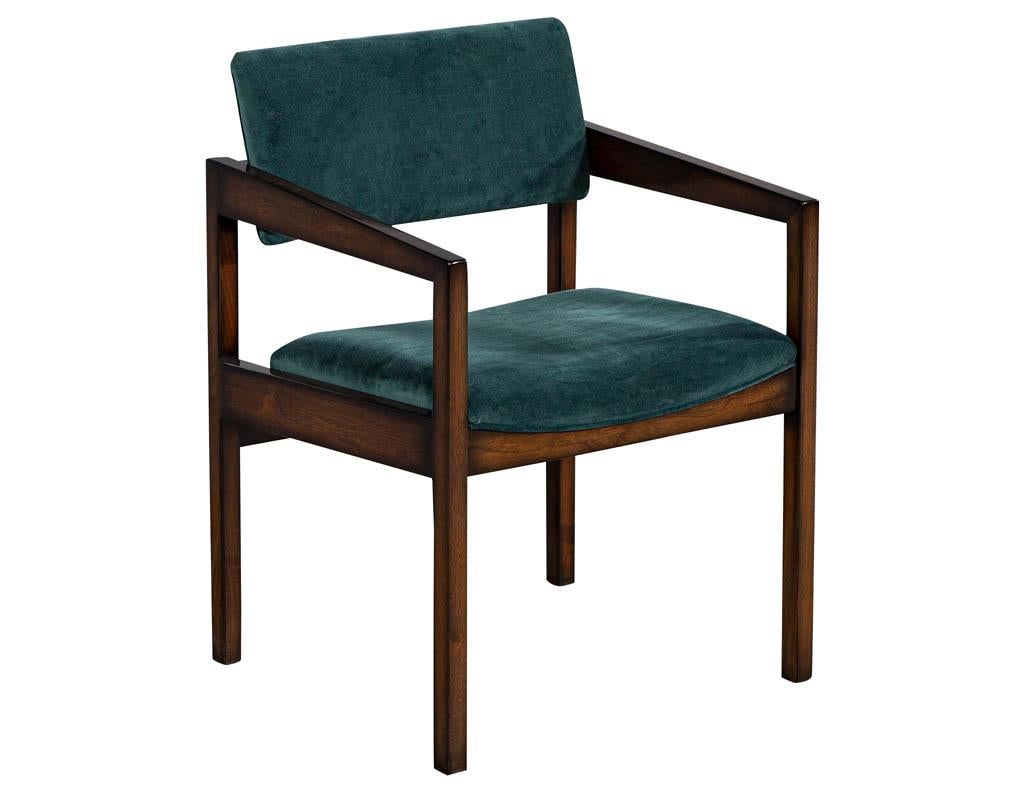 Pair of Mid-Century Modern accent armchairs. Refinished in a rich walnut color and reupholstered in an emerald velvet.
Seat depth of 17