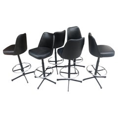 Paire de tabourets de bar réglables de style mi-siècle moderne