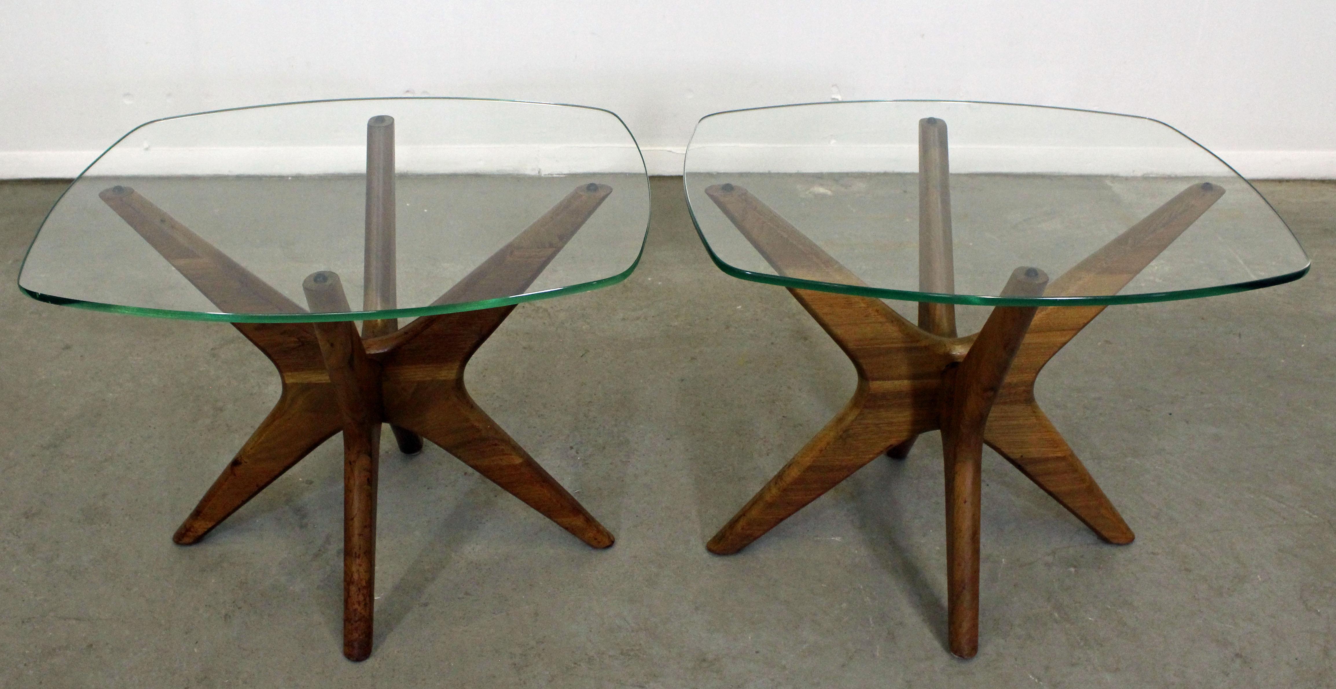 Offered is an authentic pair of Adrian Pearsall 'Jacks' end tables sculpted wooden bases and thick glass tops. In good condition for their age (surface scratches, small chip on one table top, age wear-- see photos). They are not signed. A great