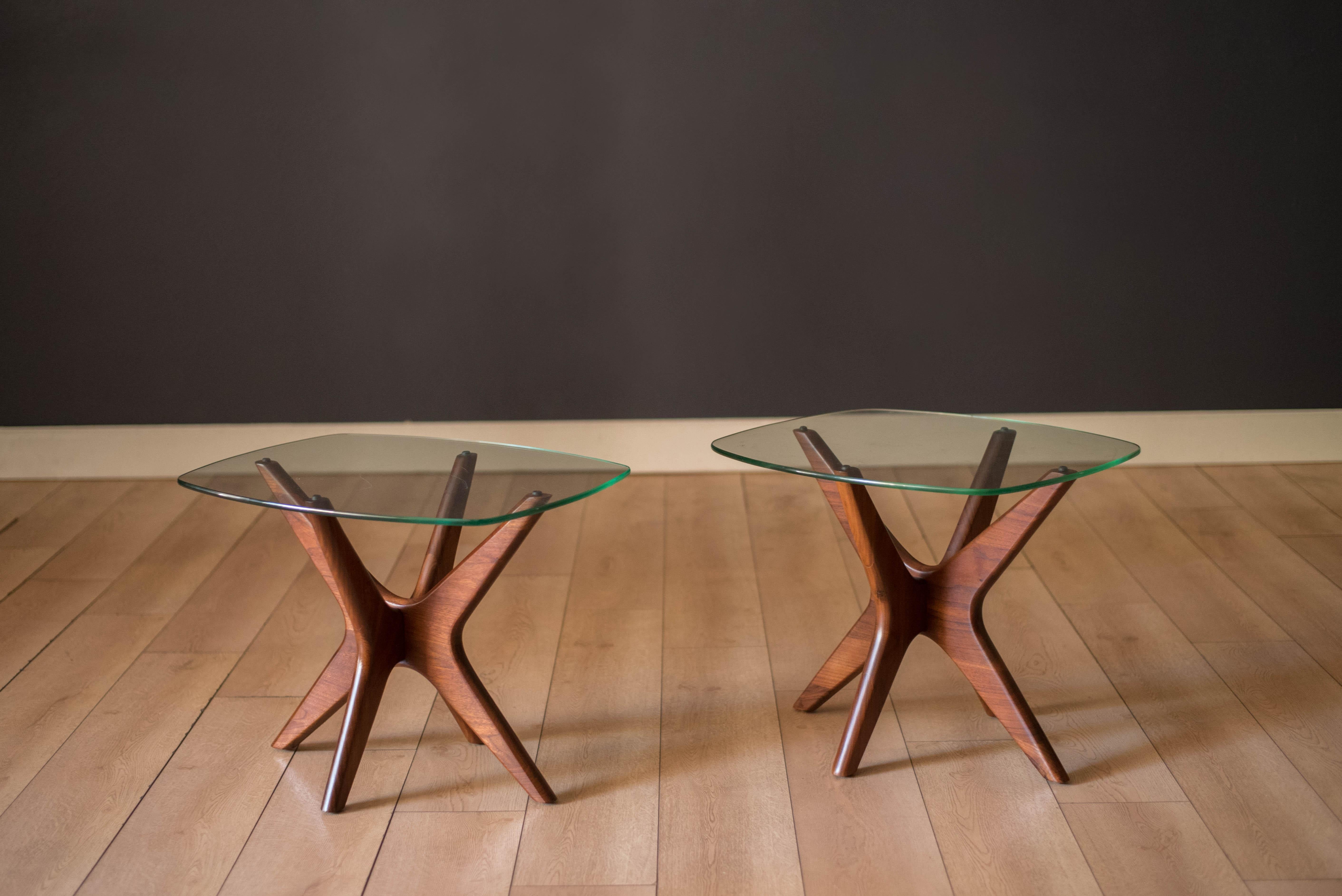 Vintage pair of 'Jacks' side tables designed by Adrian Pearsall for Craft Associates circa 1960's. The bases are made of sculpted solid walnut and includes the original curved glass tops. Price is for the pair.




Offered by Mid Century Maddist