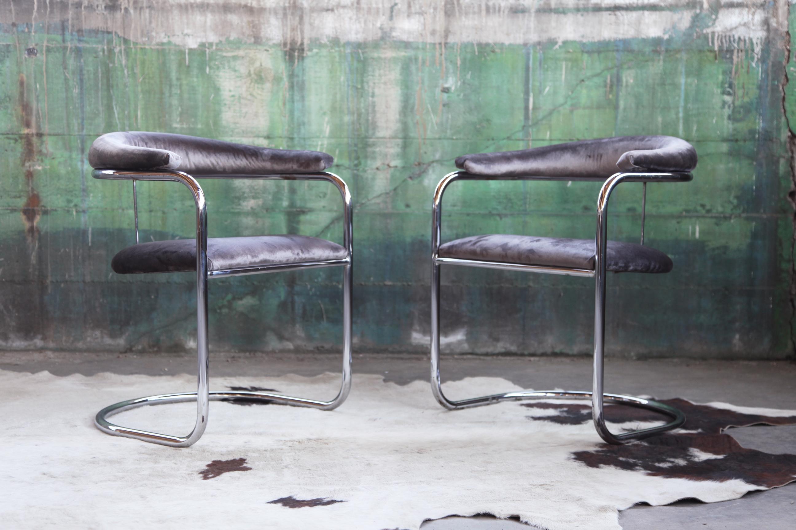 Mid-Century Modern vintage original ss33 arm chairs by Iconic Italian Designer Anton Lorenz for Thonet circa 1930-1940s and 1960-1970s. This Classic chair is a beauty. This pair are nicely reupholstered in a grey velour textile, circa the 1970s. We