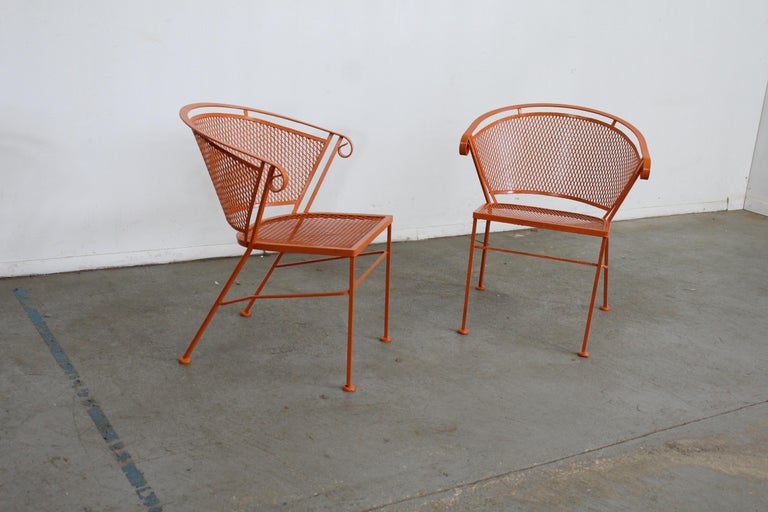 Pair of Mid-Century Modern Atomic orange outdoor metal curved back chairs

Offered is a pair of Pair of Mid-Century Modern Atomic orange Outdoor Metal Curved Back chairs, circa 1968. These chairs have been repainted in an atomic orange. They're in