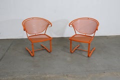 Pair of Mid-Century Modern Atomic Orange Salterini Style Outdoor Metal Curved Ba