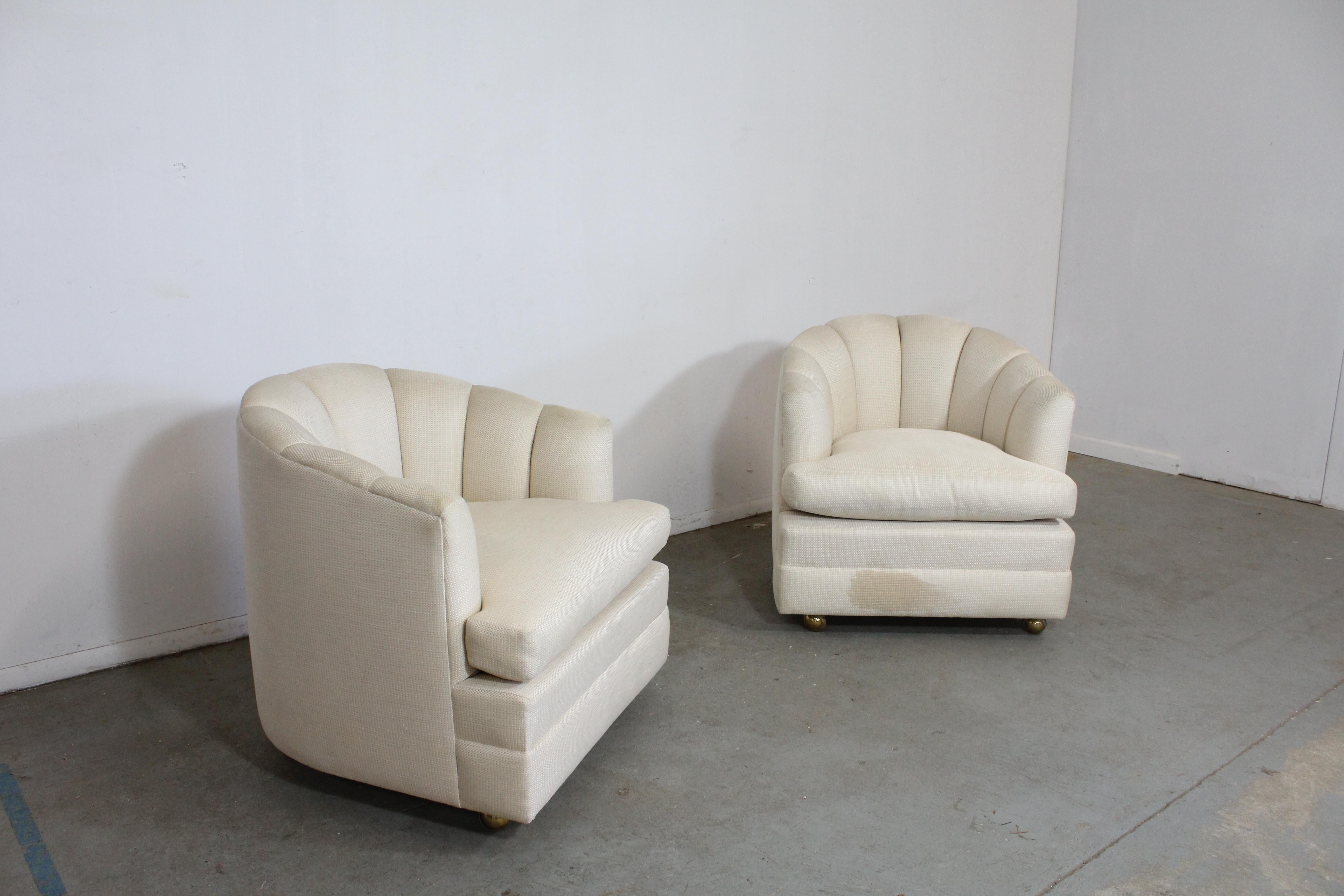 Pair of Mid-Century Modern barrel back club chairs

Offered is a pair of vintage Mid-Century Modern style chairs. These chairs have round backs. We're unsure of their exact age, but we estimate mid-late 20th century. They are in decent condition,
