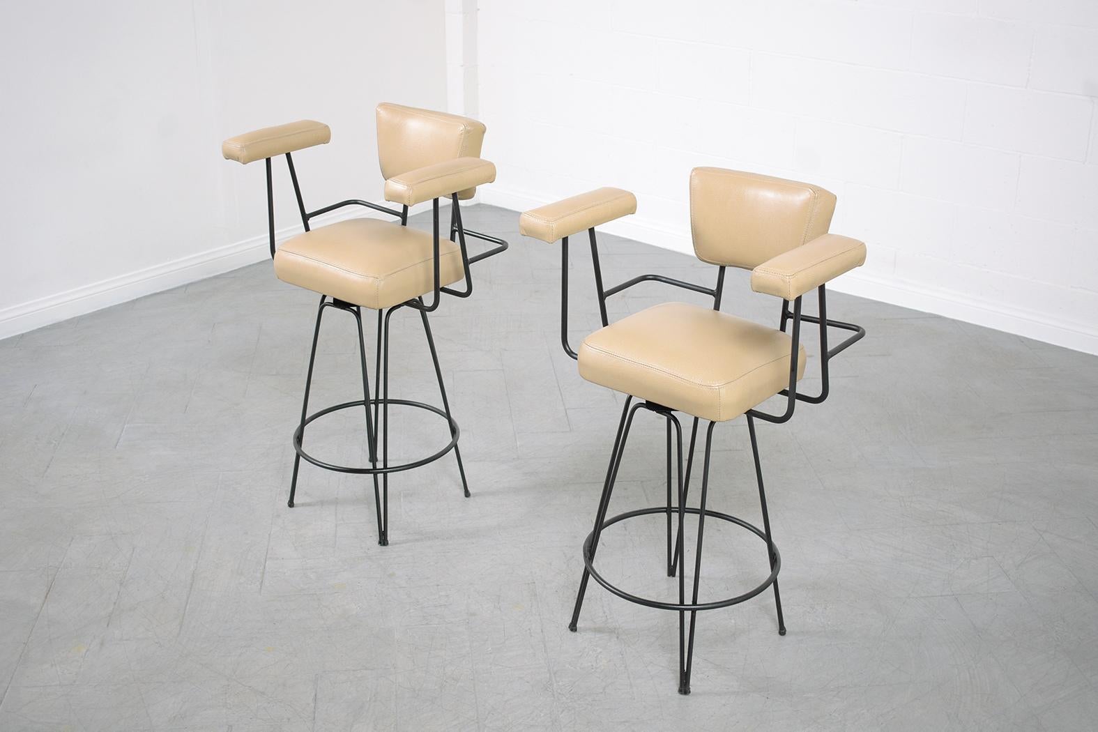 Restored 1970s Mid-Century Modern Swivel Barstools in Beige Leather In Good Condition For Sale In Los Angeles, CA