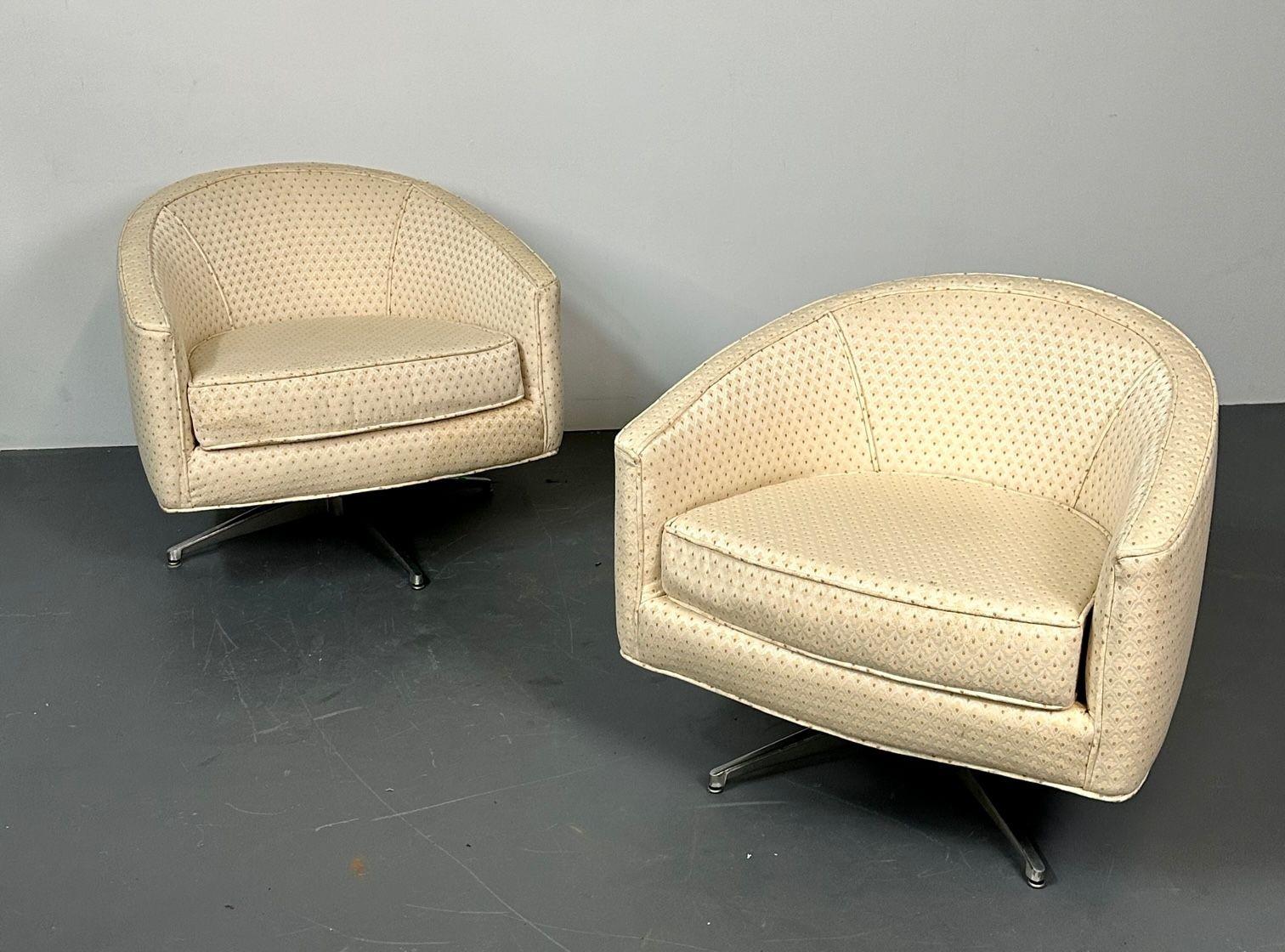 Mid-Century Modern American Designer Swivel / Lounge Chairs
Pair of modern swivel chairs perfect for an office, retail, or residential setting. Original fabric/cushioning. 
Other American designers of the period include Milo Baughman, Paul McCobb,