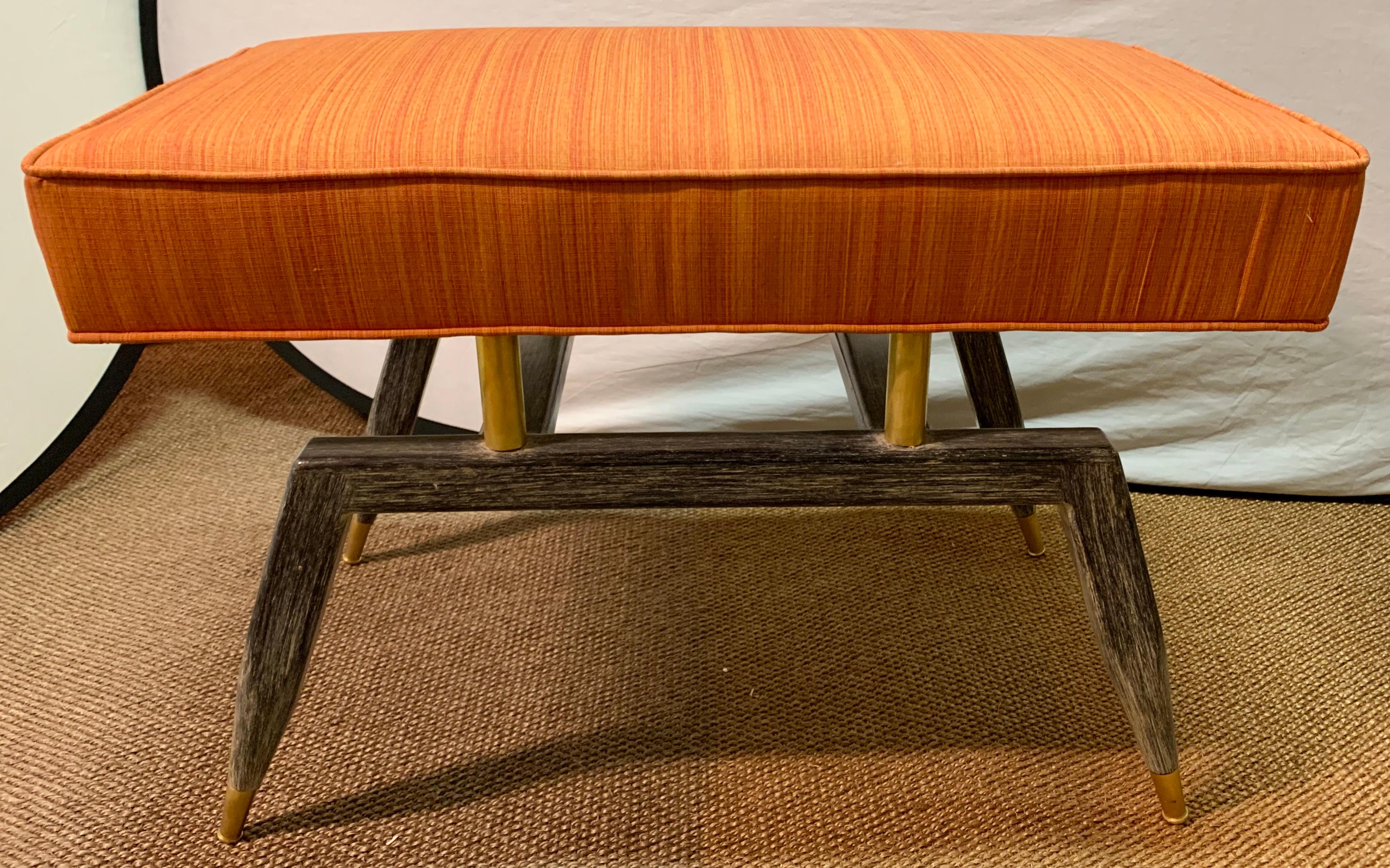 Pair of Mid-Century Modern benches on sprayed legs with new fabric on brass supports.