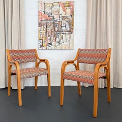 Coppia di poltrone Mid Century Modern in legno curvato