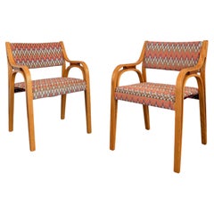Coppia di poltrone Mid Century Modern in legno curvato