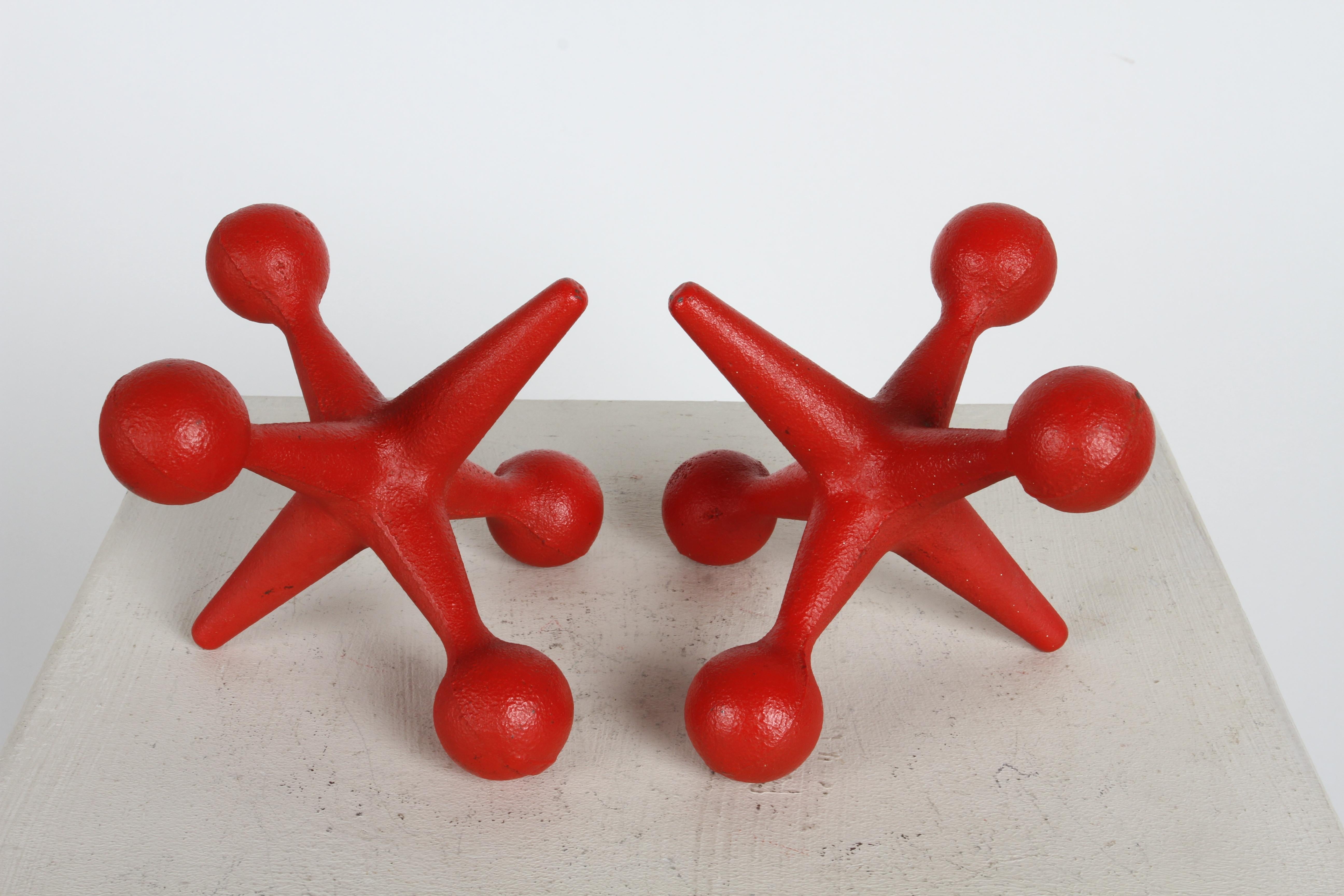 Bill Curry for Design line very fun pop red colored playful iron jacks bookends or decorative objects. Often attributed to George Nelson, these are all original paint. Some light scuffs.  

