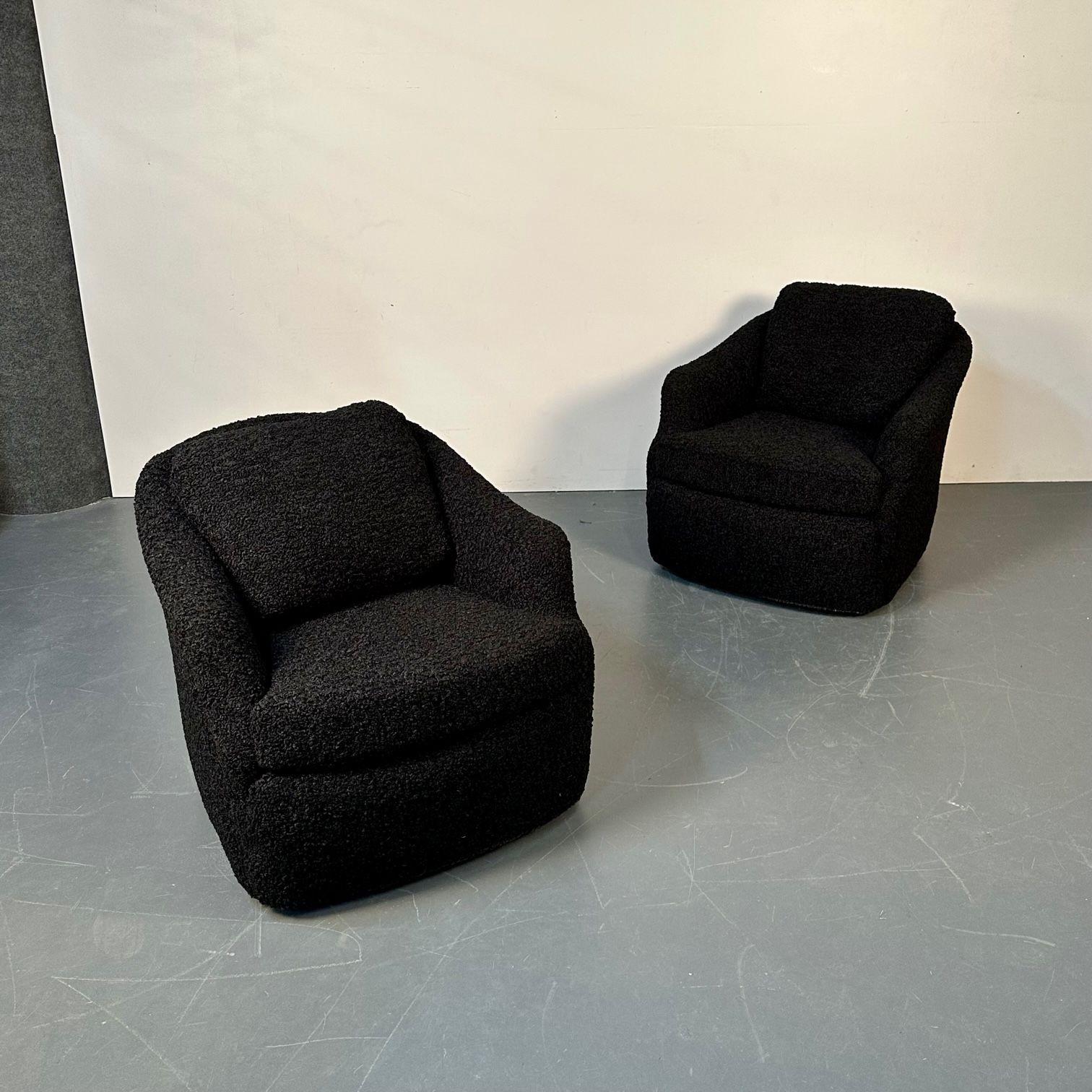 Pair of Mid-Century Modern black boucle tub / swivel / lounge chairs, Faux Fur
 
29H x 31.75W x 34D / SH 19.
