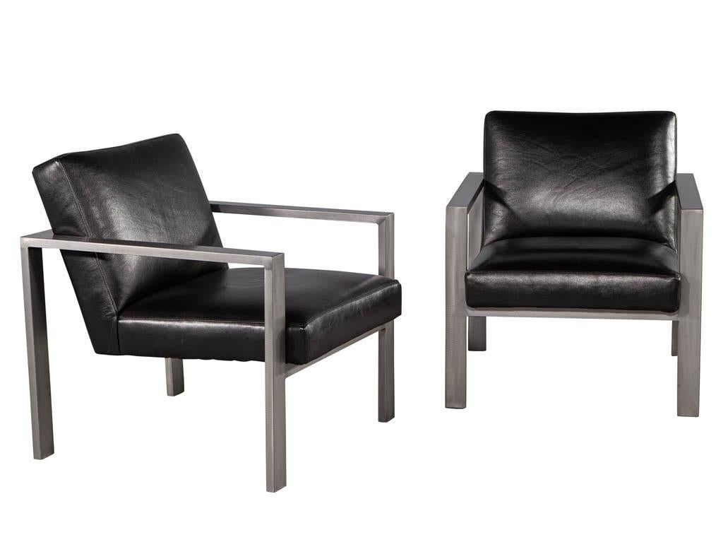 Late 20th Century Pair of Mid-Century Modern Black Leather Metal Lounge Chairs with Ottomans For Sale