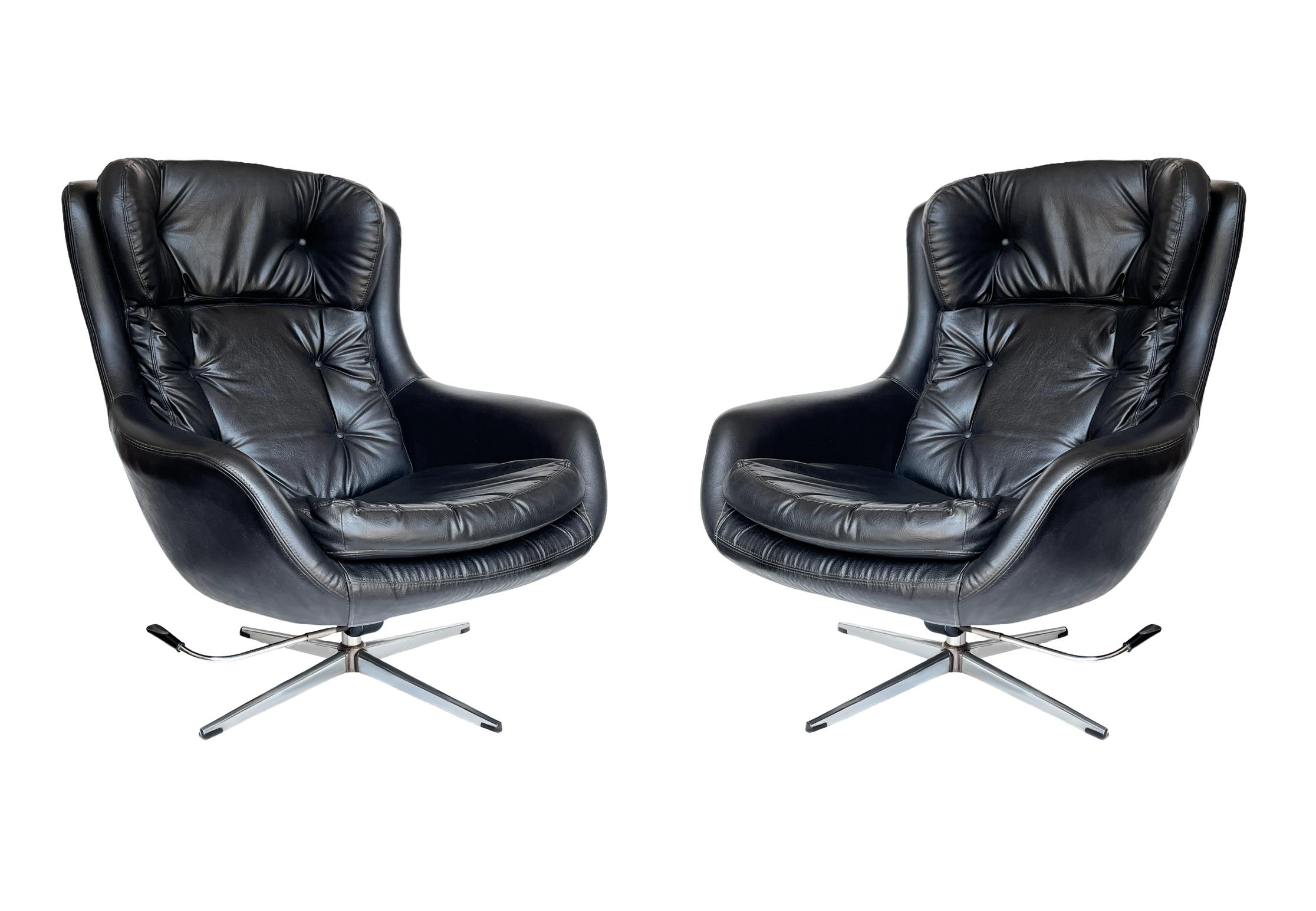 Steel Pair of Mid Century Modern Black Swivel Lounge Chairs by Overman Sweden  For Sale