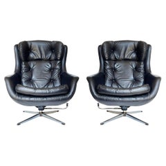 Pair of Mid Century Modern Black Swivel Lounge Chairs by Overman Sweden 