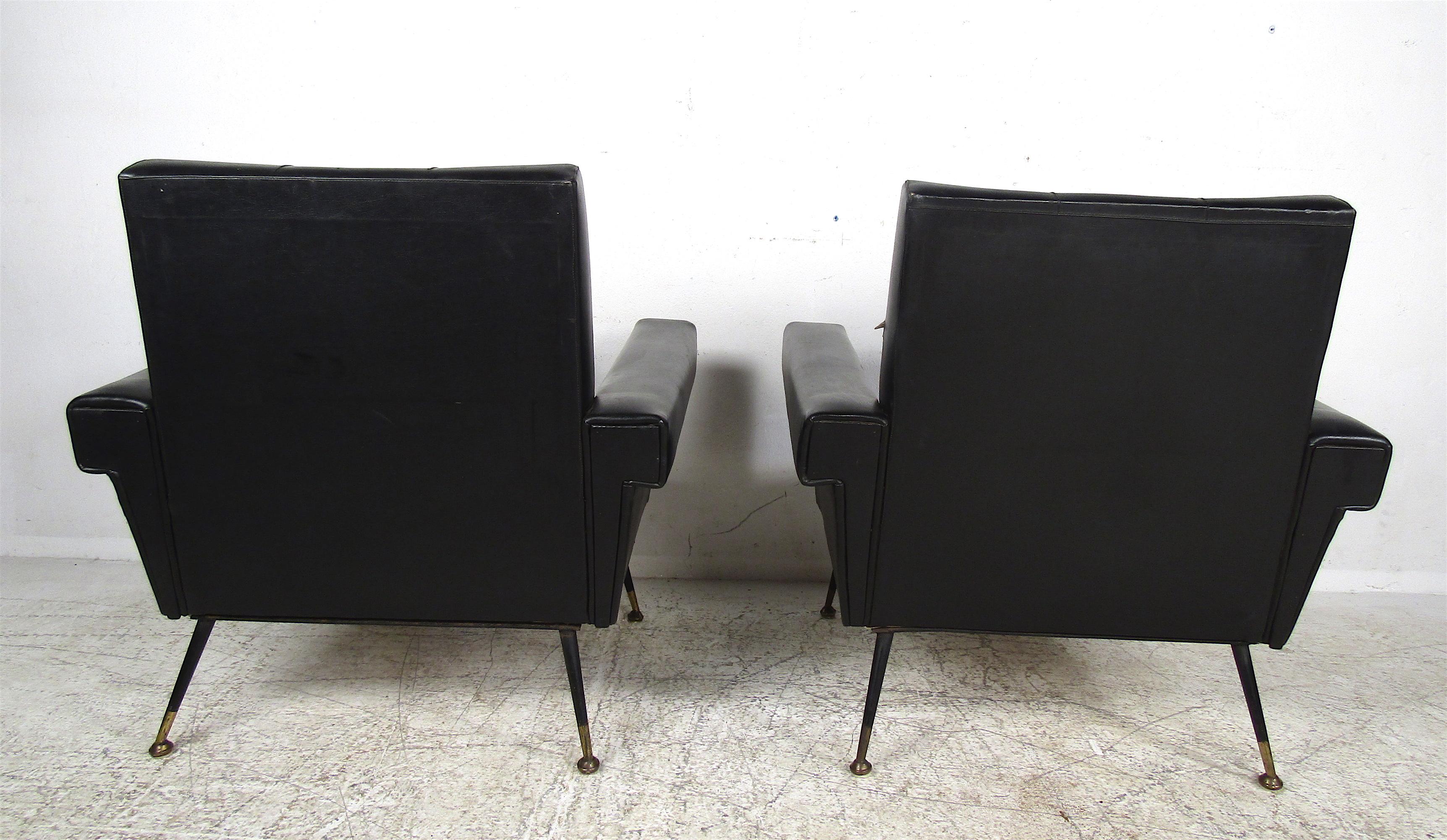 Metal Pair of Mid-Century Modern Black Vinyl Lounge Chairs