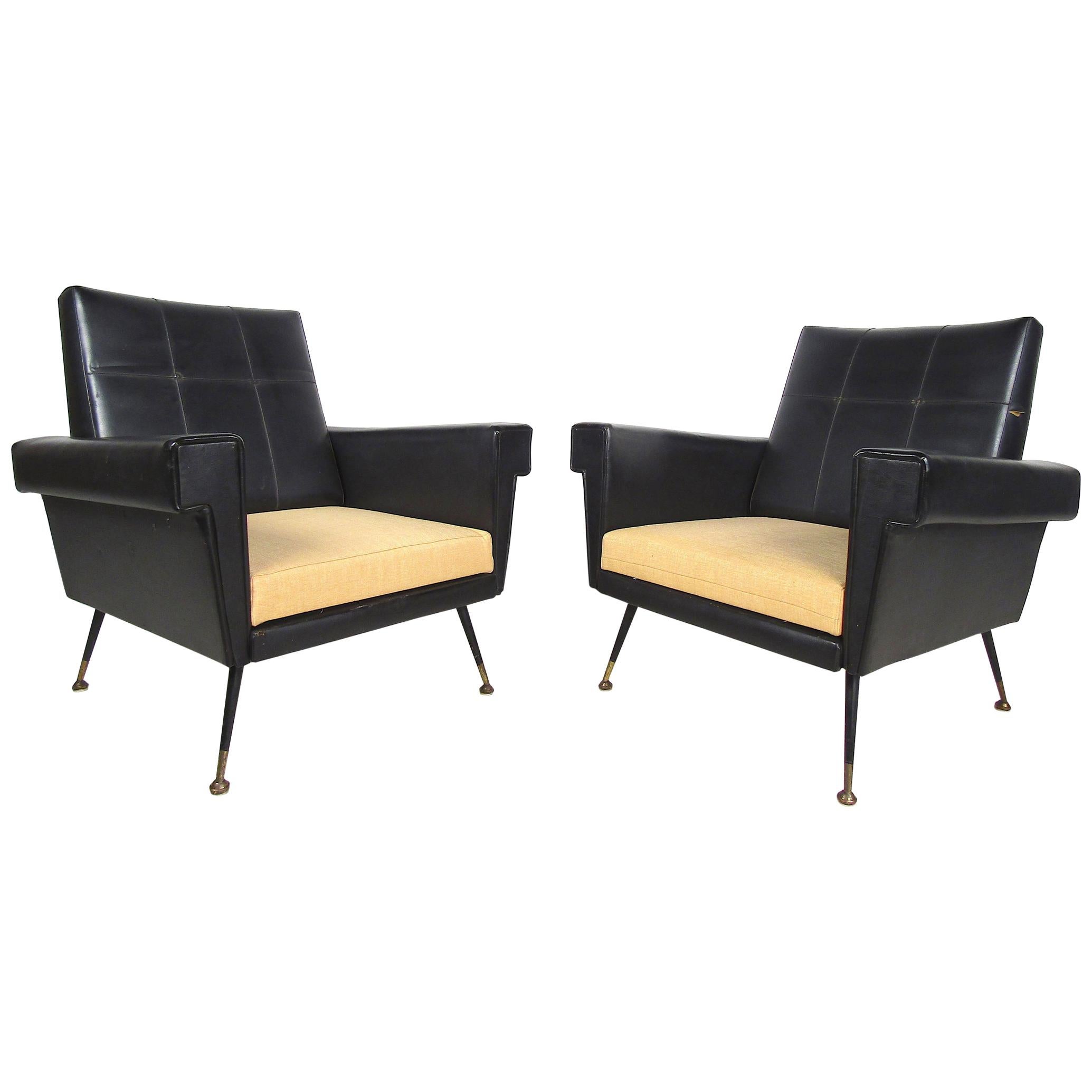 Pair of Mid-Century Modern Black Vinyl Lounge Chairs