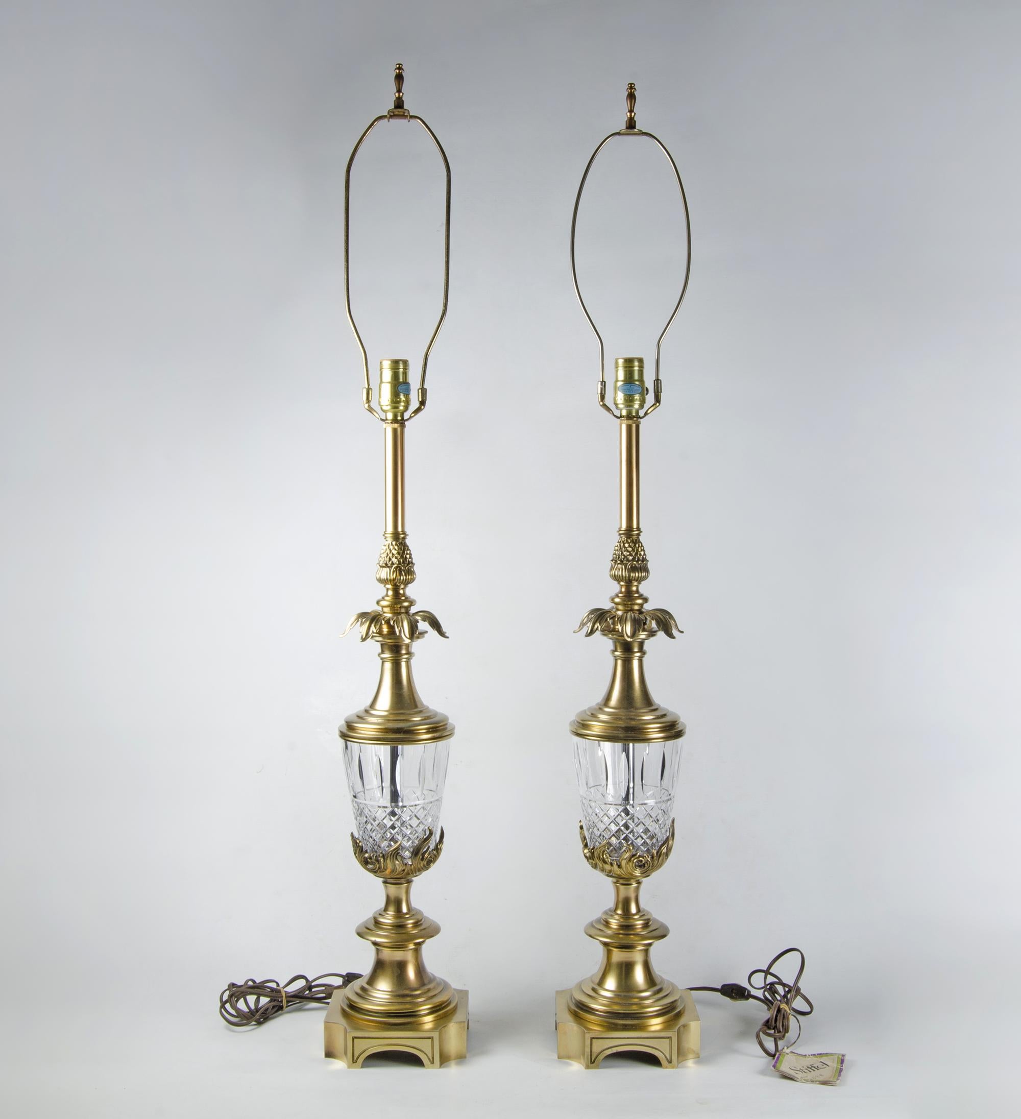 Pair of Mid-Century Modern golden brass and glass table lamps by Stiffel, United States

By: Stiffel
Material: brass, copper, zinc, metal, glass, crystal, cord
Technique: cast, molded, polished, metalwork
Dimensions: 6.5 in x 6.5 in x 42 in
Date:
