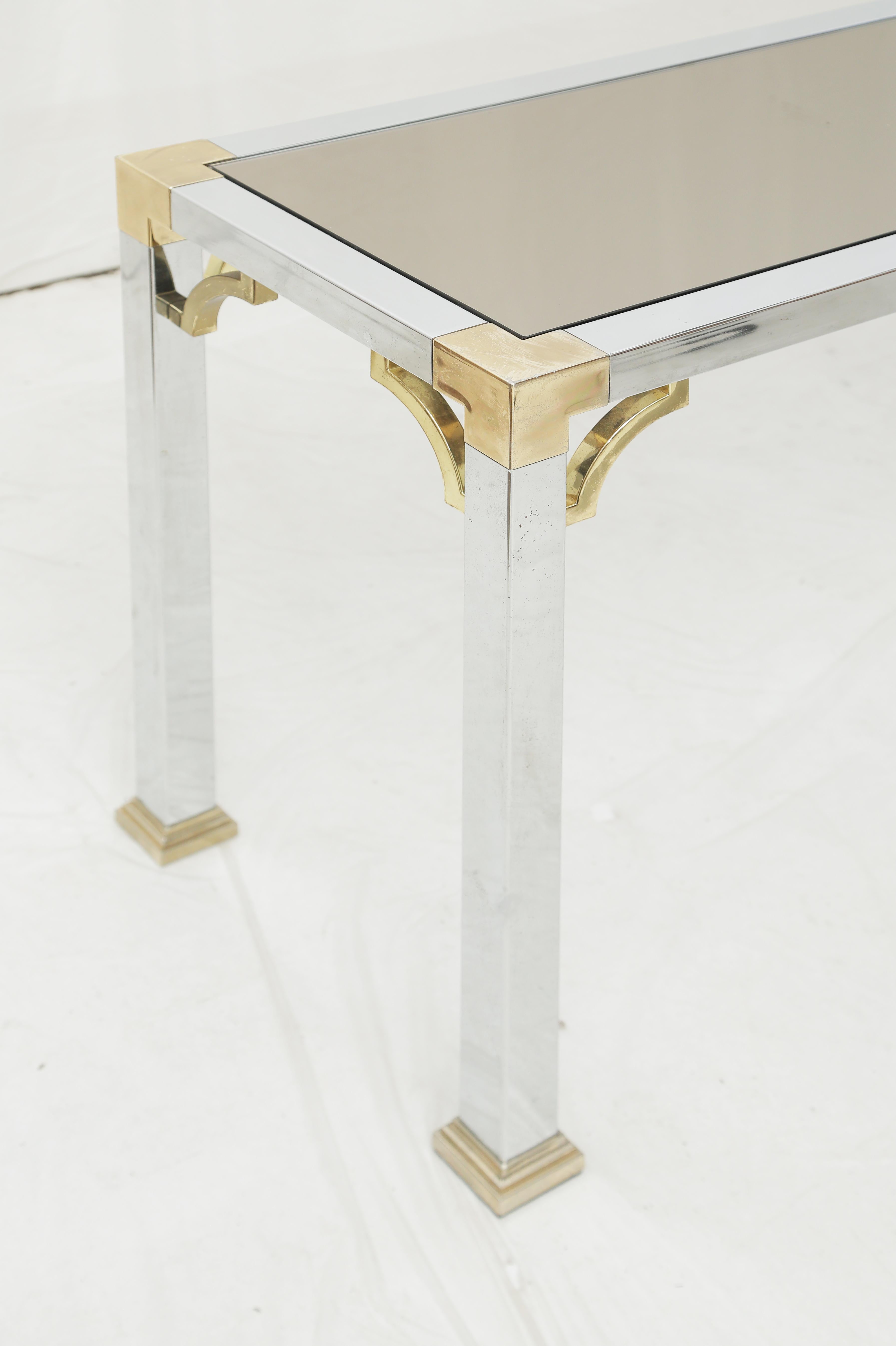 Late 20th Century Pair of Mid-Century Modern Brass & Chrome Console Tables with a Dark Mirror Top