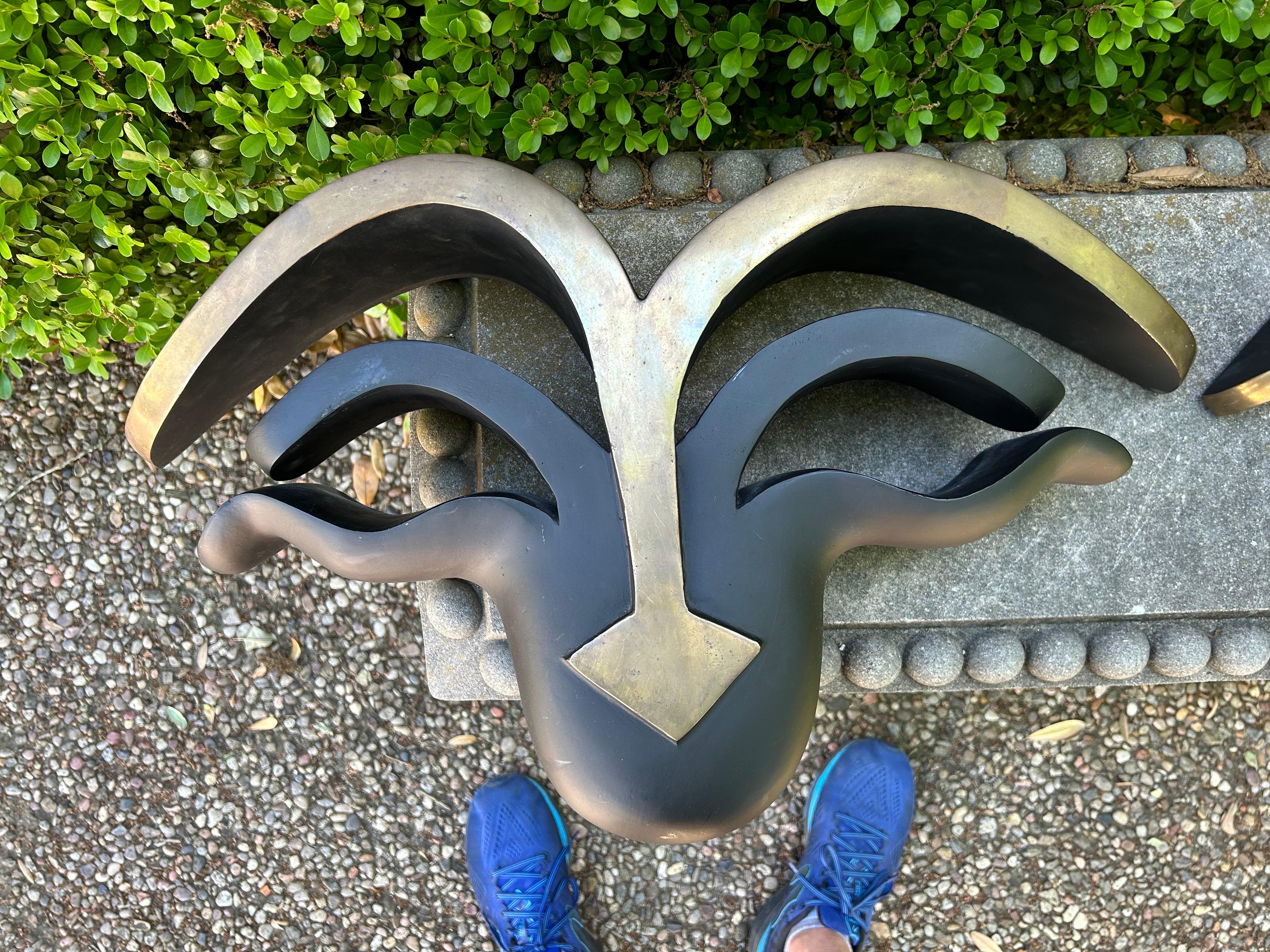Pair Of Mid Century Modern Bronze Wall Brackets.
This unusual pair of sold bronze wall brackets make great wall accessories.
Can be used as wall sculptures in place of sconces where access to electricity is unavailable.
Most unusual!

