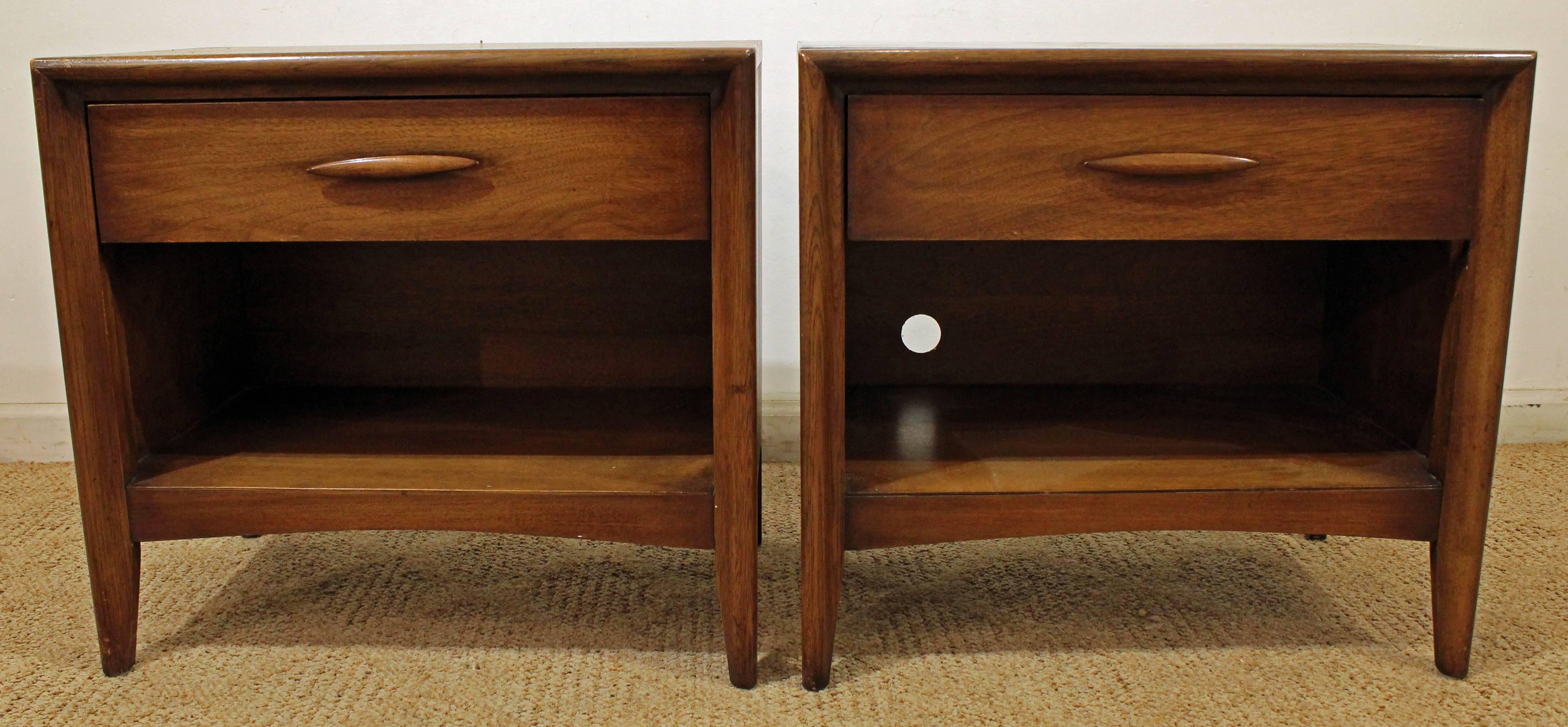Offered is a piece of time and design: a pair of Mid-Century Modern nightstands, made by Broyhill 