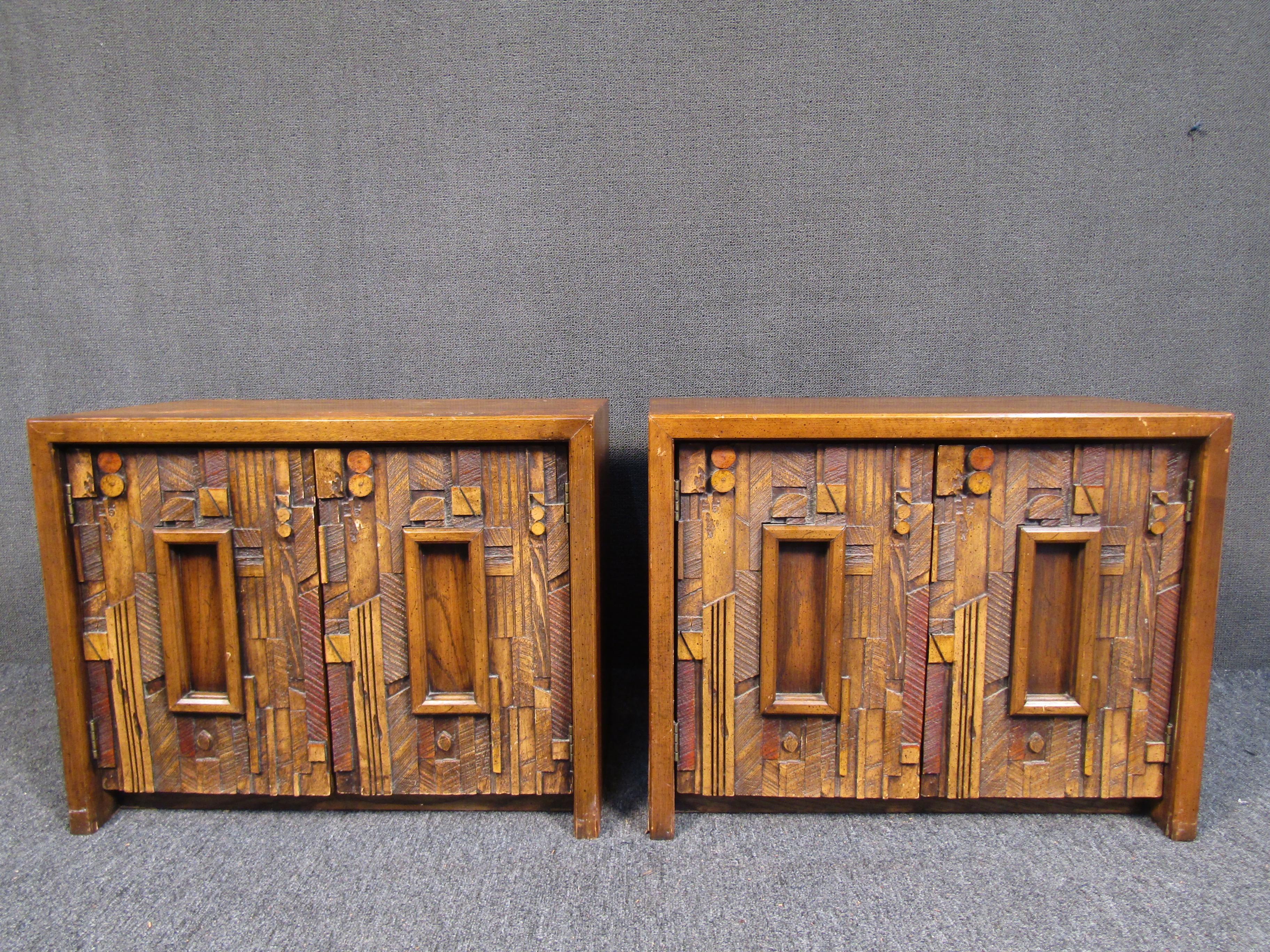Stylish pair of mid-century nightstands/end tables with Brutalist-style decorative cabinet doors. Intricately designed and sturdy, these end tables are sure to please when situated in any modern interior. Please confirm item location with the dealer