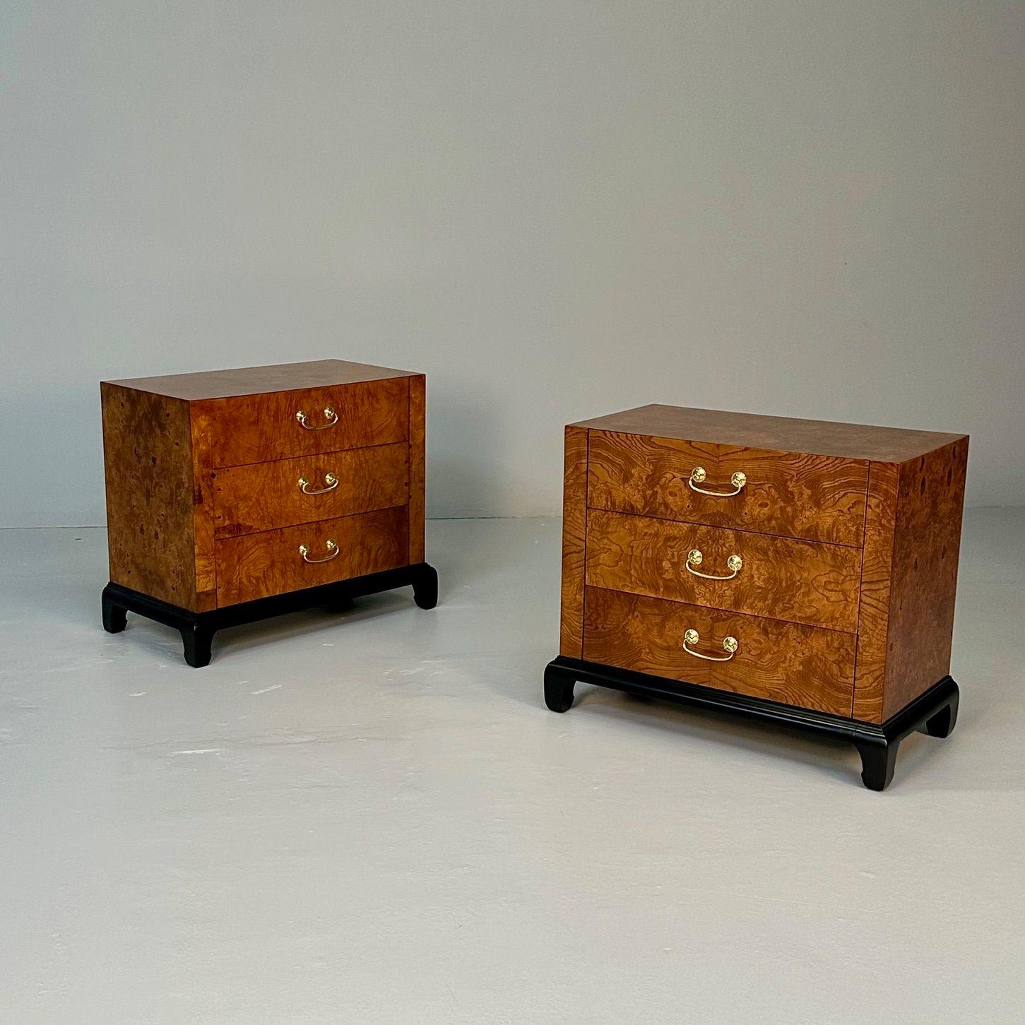 Pair of Mid-Century Modern Burlwood Nightstands / Chests or End Tables, Branded Hekman, Mastercraft Style

Each having a tortoise shell veneer exterior, three drawers with bronze handles on ebonized bracket bases. The pair finely refinished.

Three