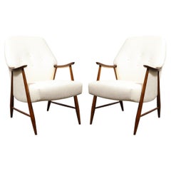 Pair of Mid-Century Modern Button Back Saddle-Armed Chairs in Handrubbed Walnut