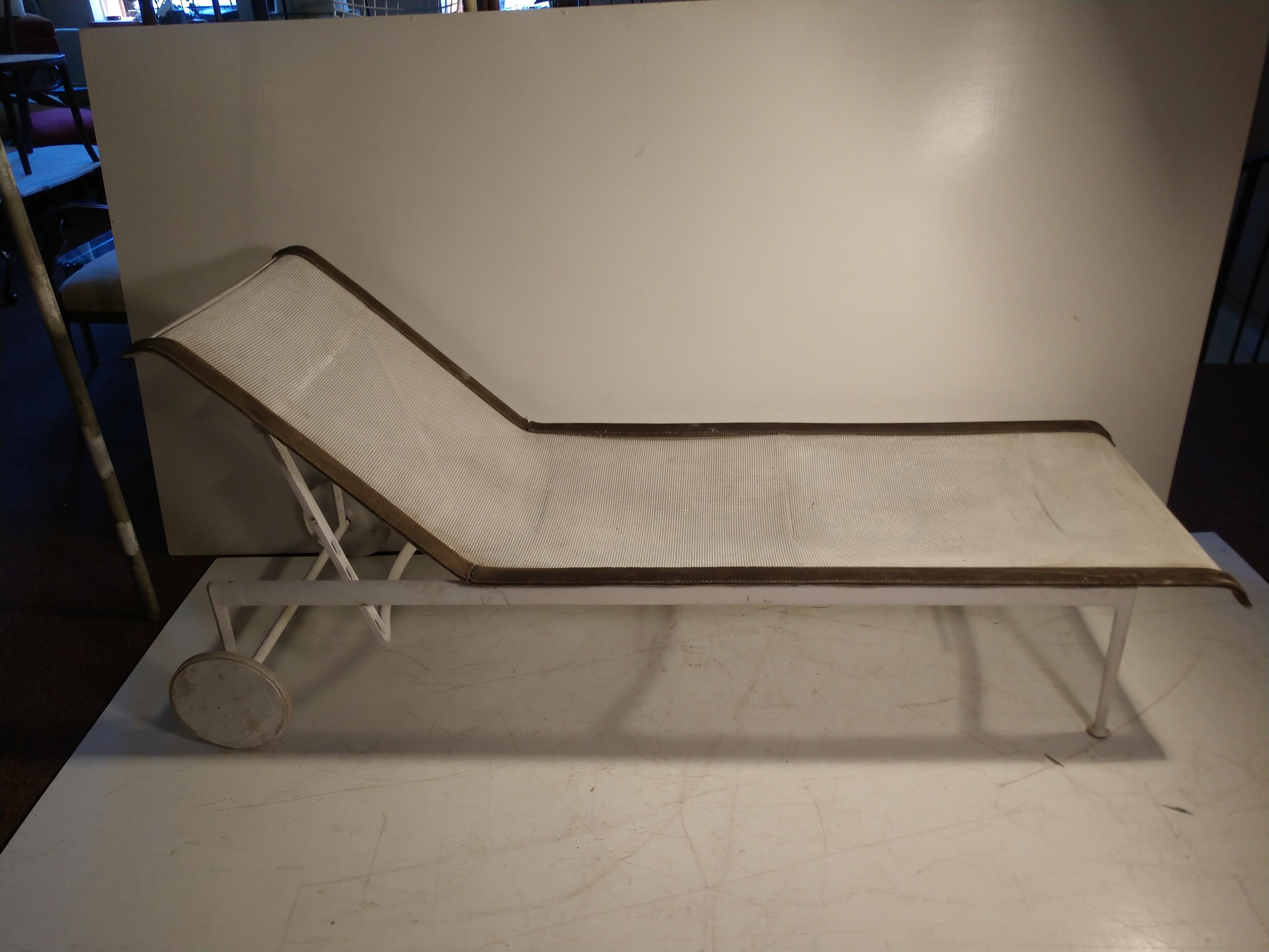 Pair of Richard Schultz for Knoll outdoor chaise lounges.
Frames are solid, no damage. Fabric is original and on need of an update. Tears and major wear to leather that frames the mesh fabric. Mesh fabric has a frame of its own which unscrews.