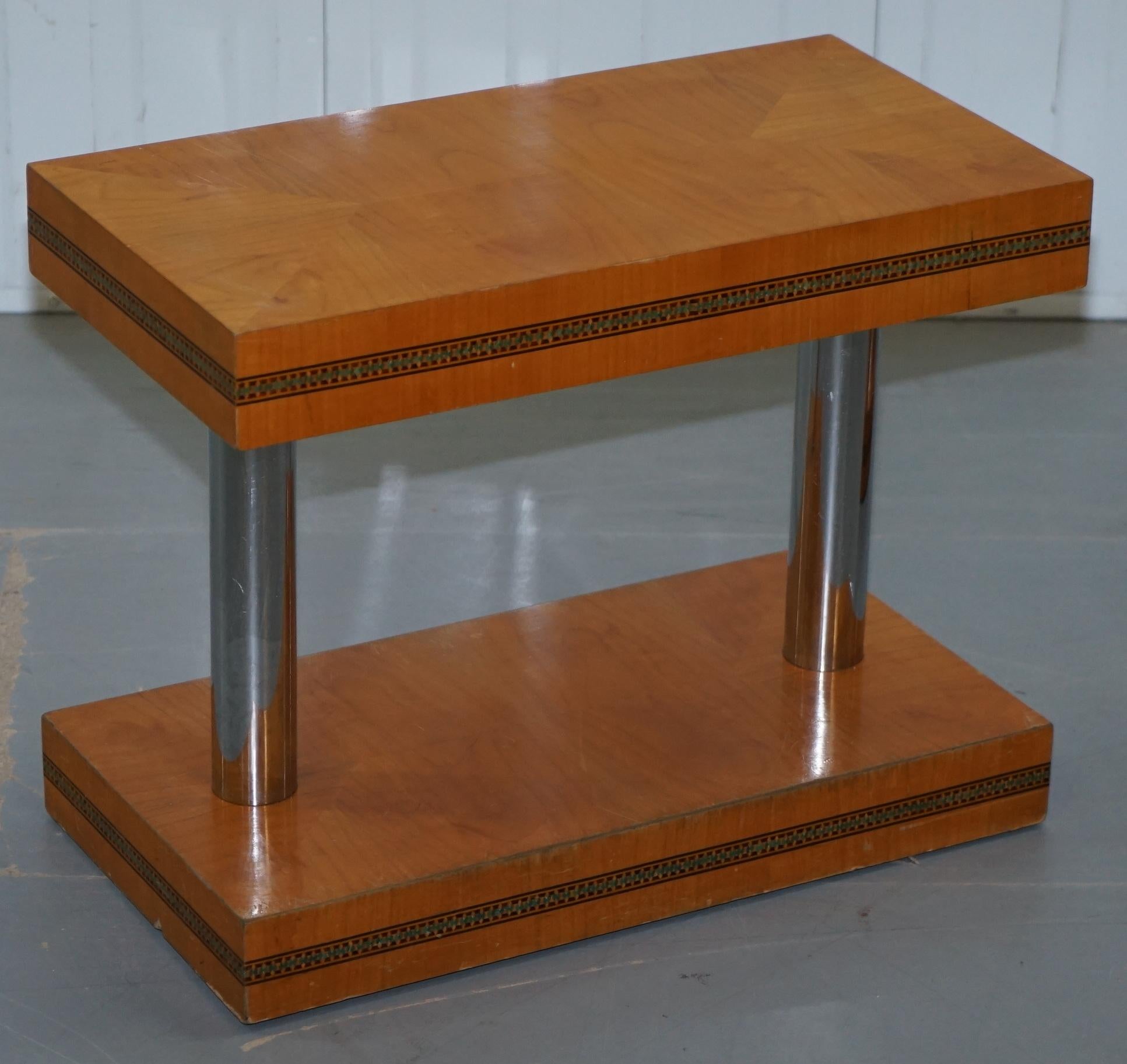 We are delighted to offer for sale this lovely pair of genuine mid-century modern Satinwood side tables with Chrome plated pillars

A very good looking and well made pair of side tables, they are quite large, if seated next to a sofa or armchair