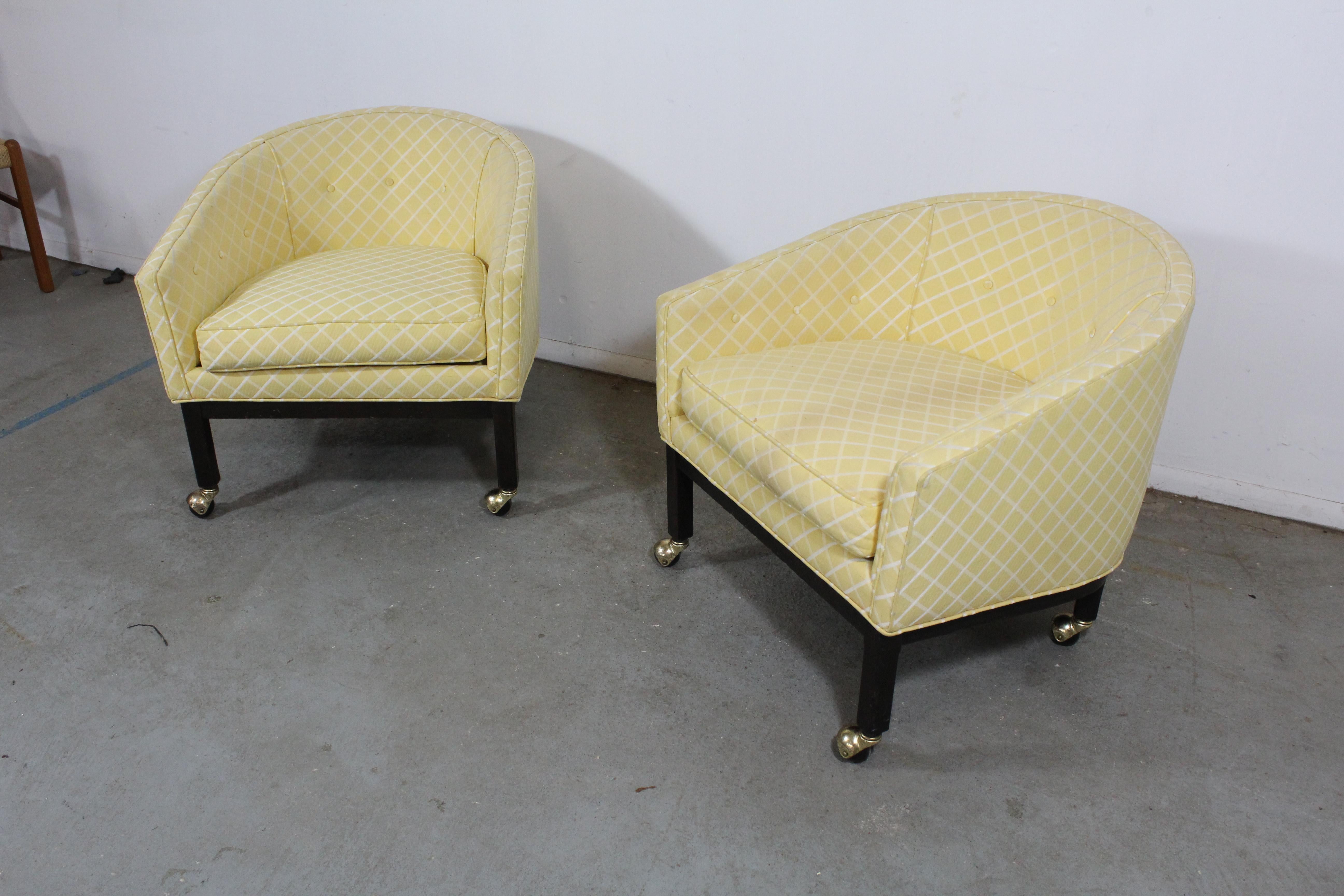 Pair of Mid-Century Modern club chairs by Kipp Stewart for Directional

What a find. Offered is a pair of club chairs on rollers by Kipp Stewart. They are unsigned. These two chairs are on rollers and their springs have been repaired. The