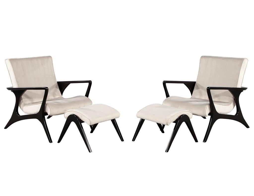 Pair of Mid-Century Modern lounge chairs. Unique curved frame design with matching foot stools in an ebonized finish. Upholstered in a grey suede with clean single pipe detail. An original iconic mid-century design from the 1960's USA.

Price